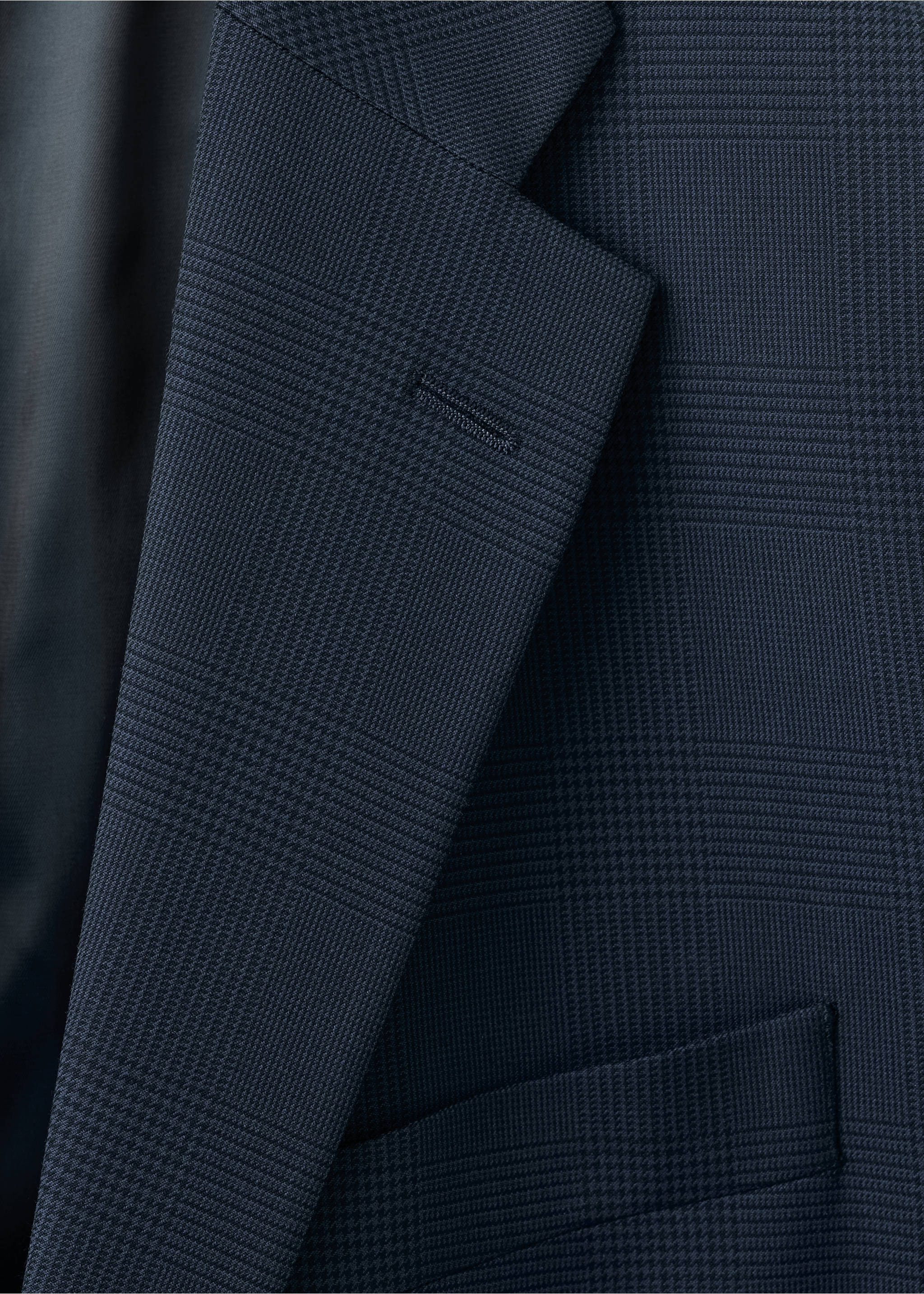 Close-up of a navy blue plaid blazer lapel and pocket., Navy. Ref: 17027140-00.
