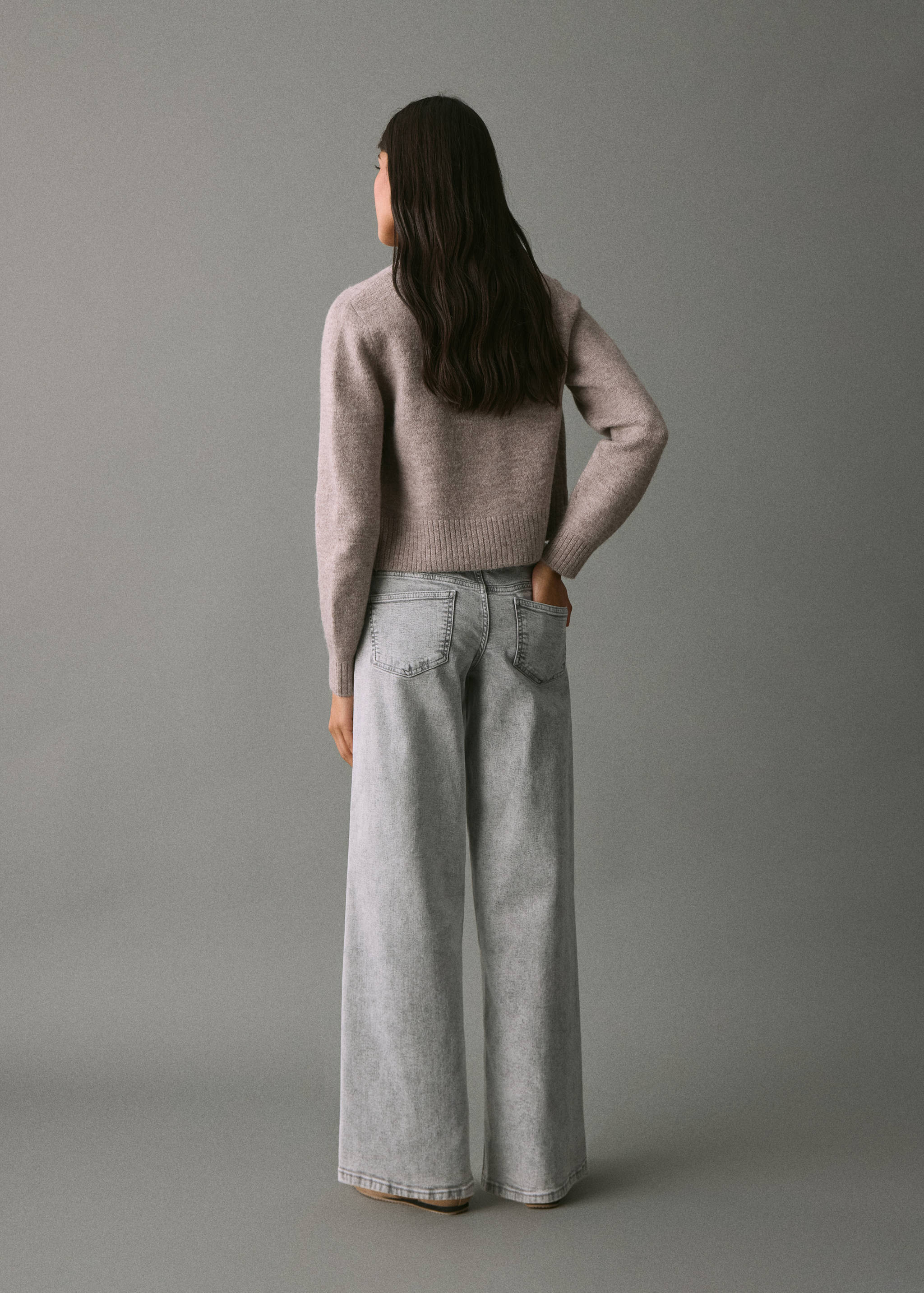 Low-waist studded jeans - Reverse of the article