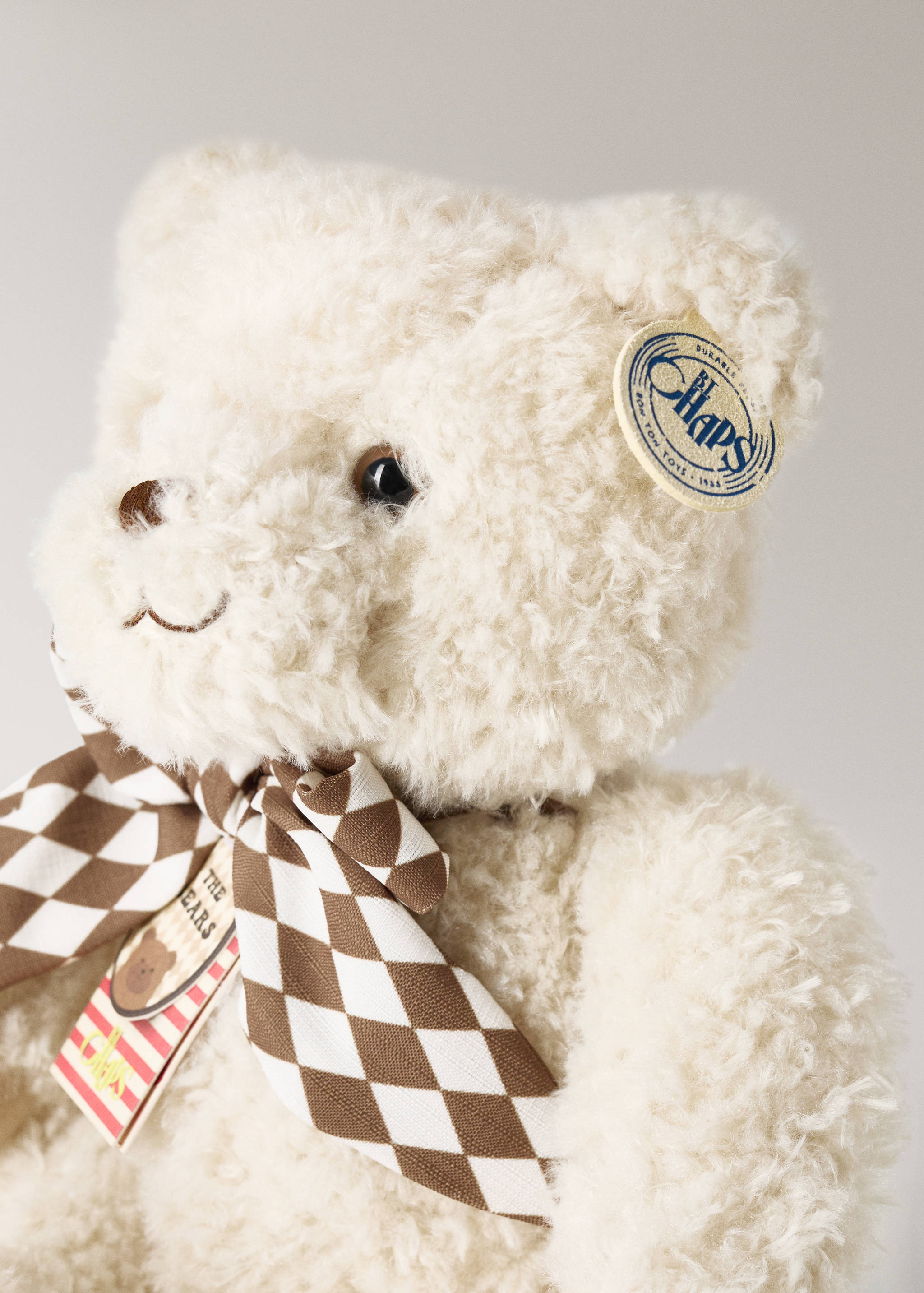 Beryl medium teddy bear with bow - Details of the article 2