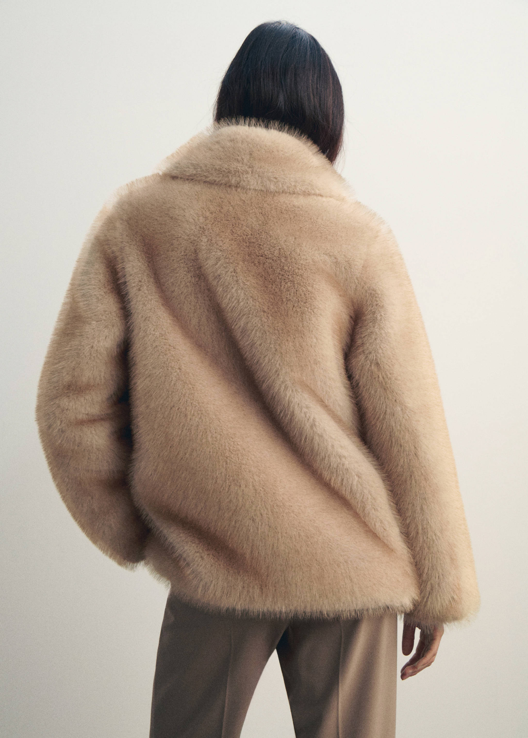 Faux-fur coat with buttons - Reverse of the article