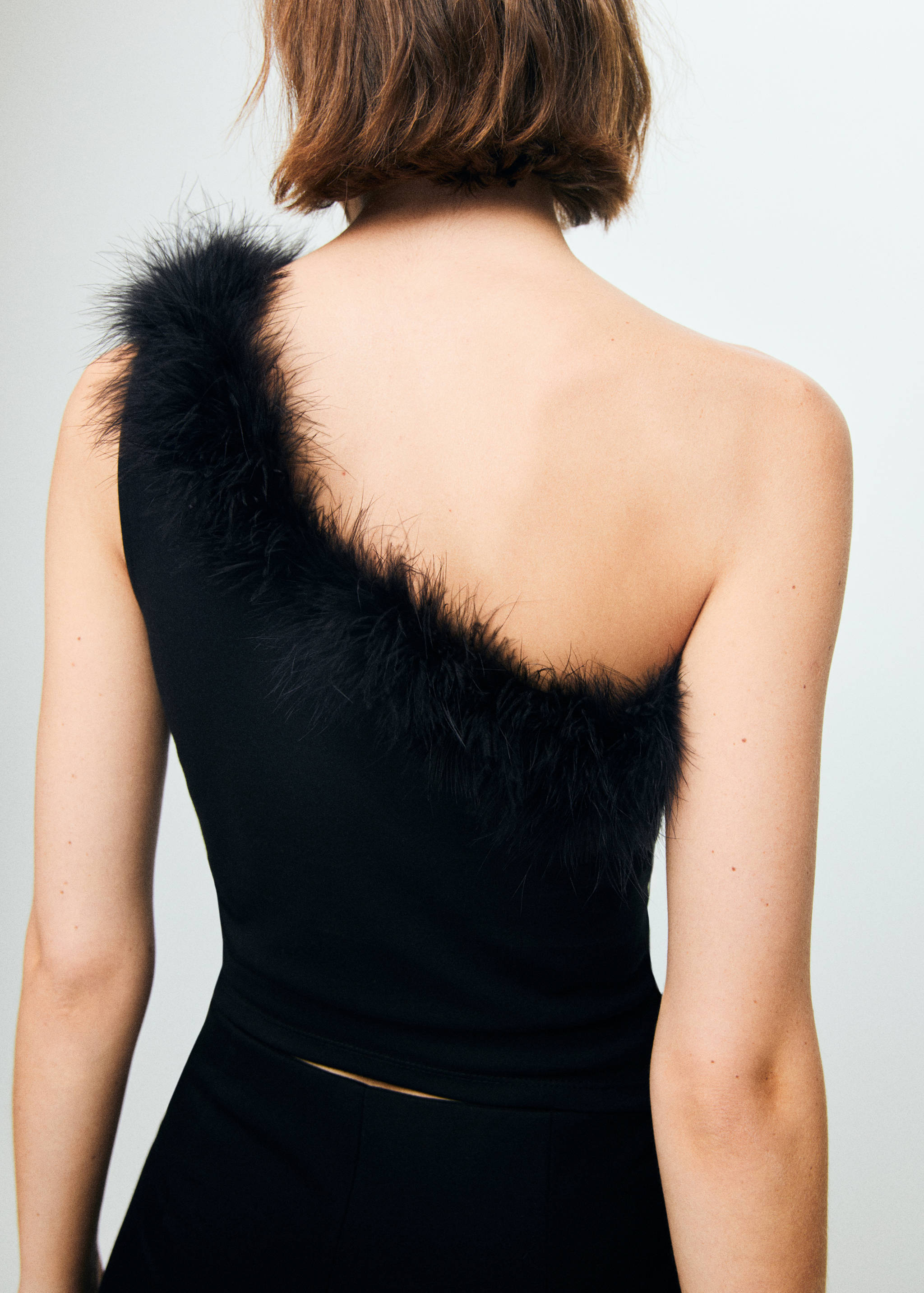 Top punto fino plumas - Reverso del artículo