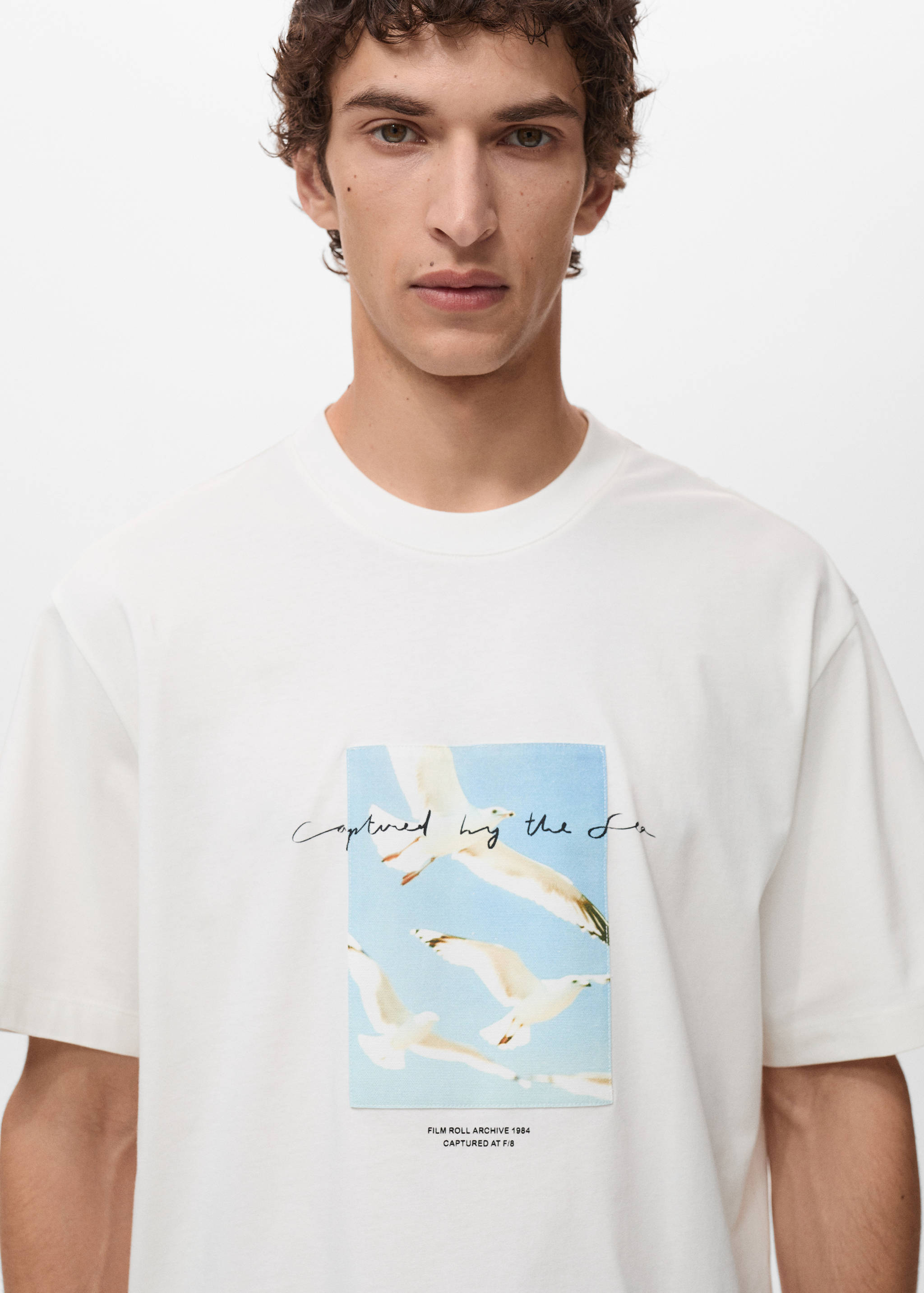 T-shirt with printed patch - Details of the article 1