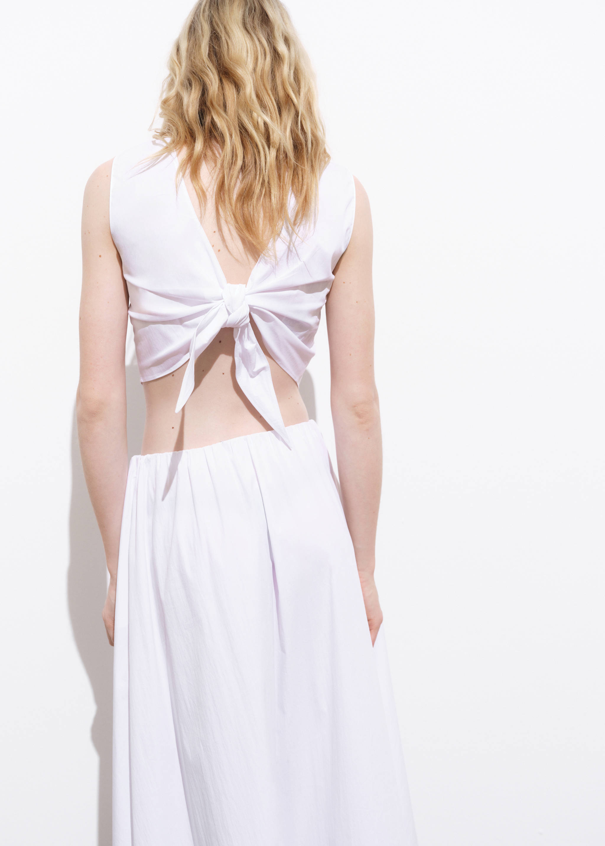 Crop top with bow on the back - Reverse of the article