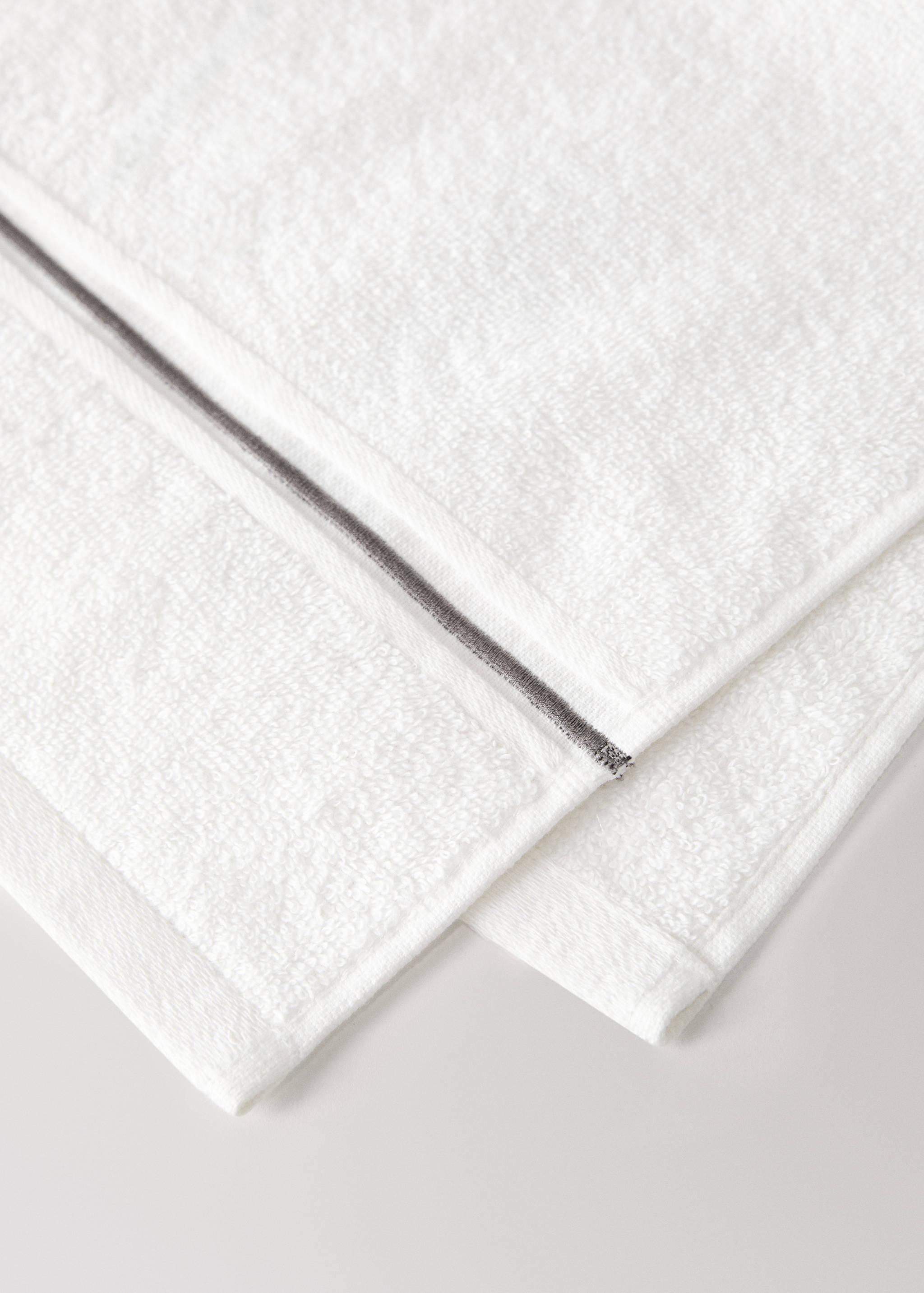 Gästetuch aus Baumwolle mit besticktem Muschelsaum - Detail des Artikels 1