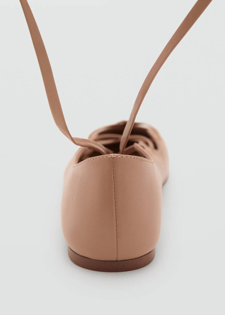 Leather ballet flats with crossed straps — Nude