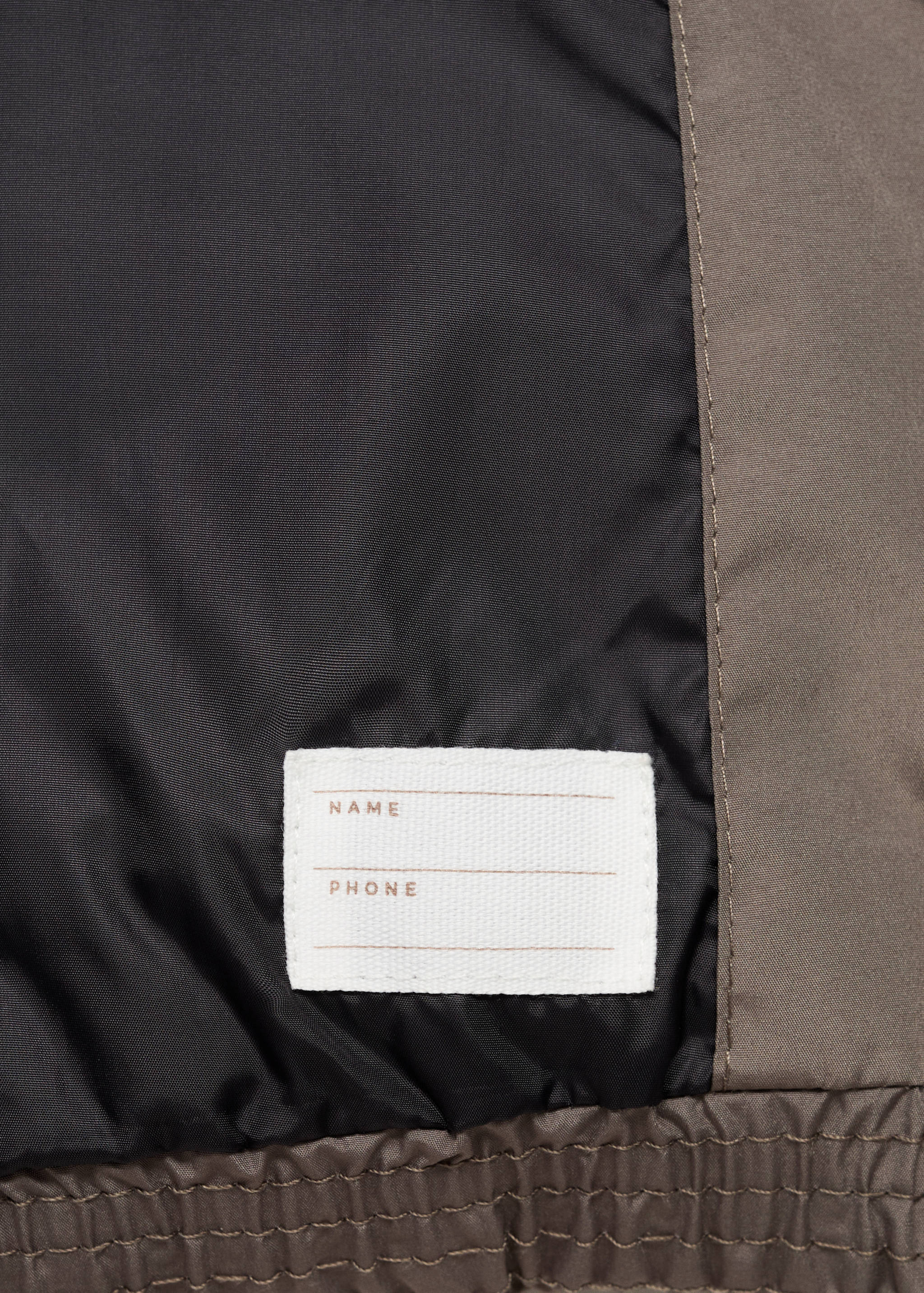 Quilted gilet with hood - Details of the article 0