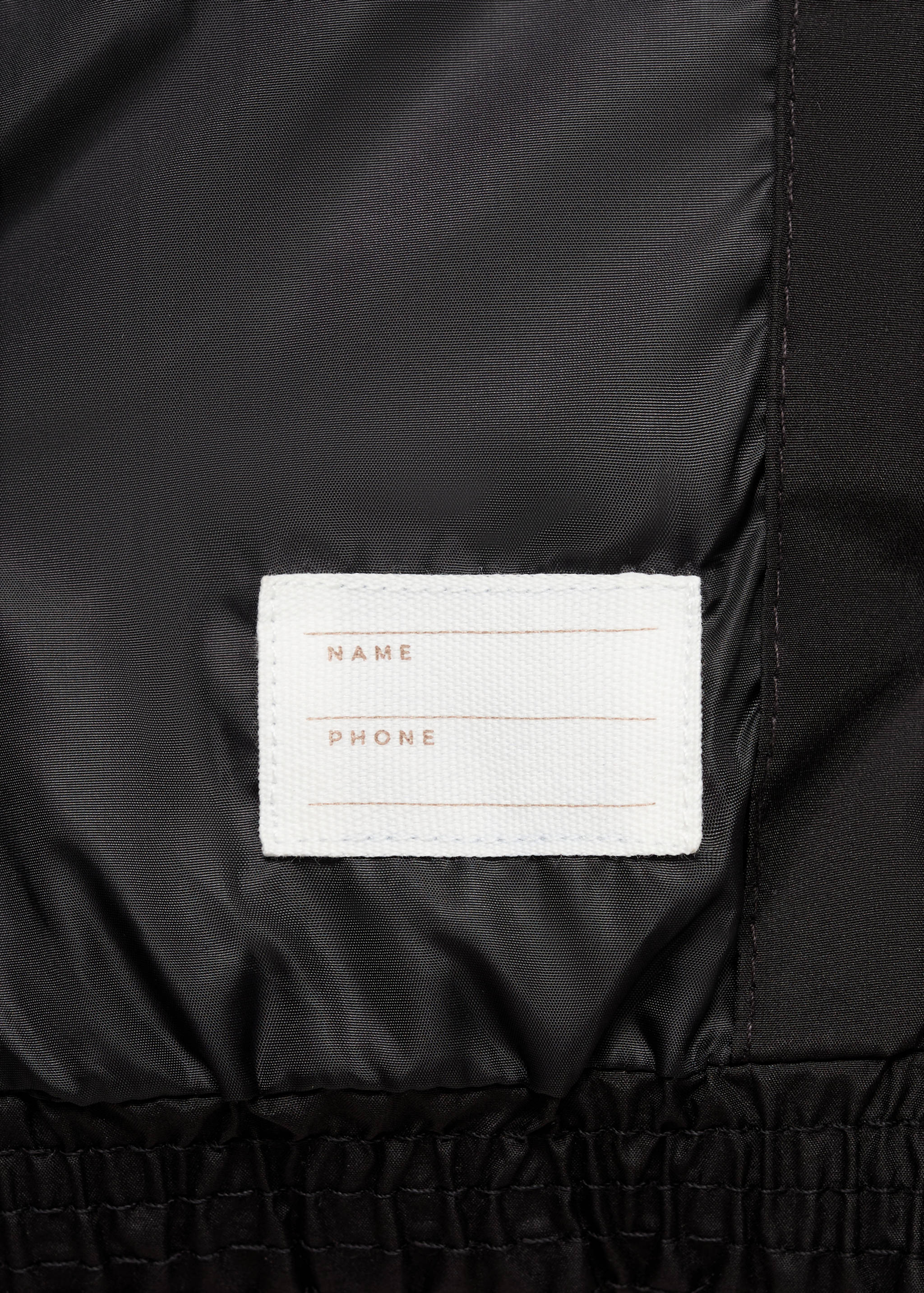 Quilted gilet with hood - Details of the article 0