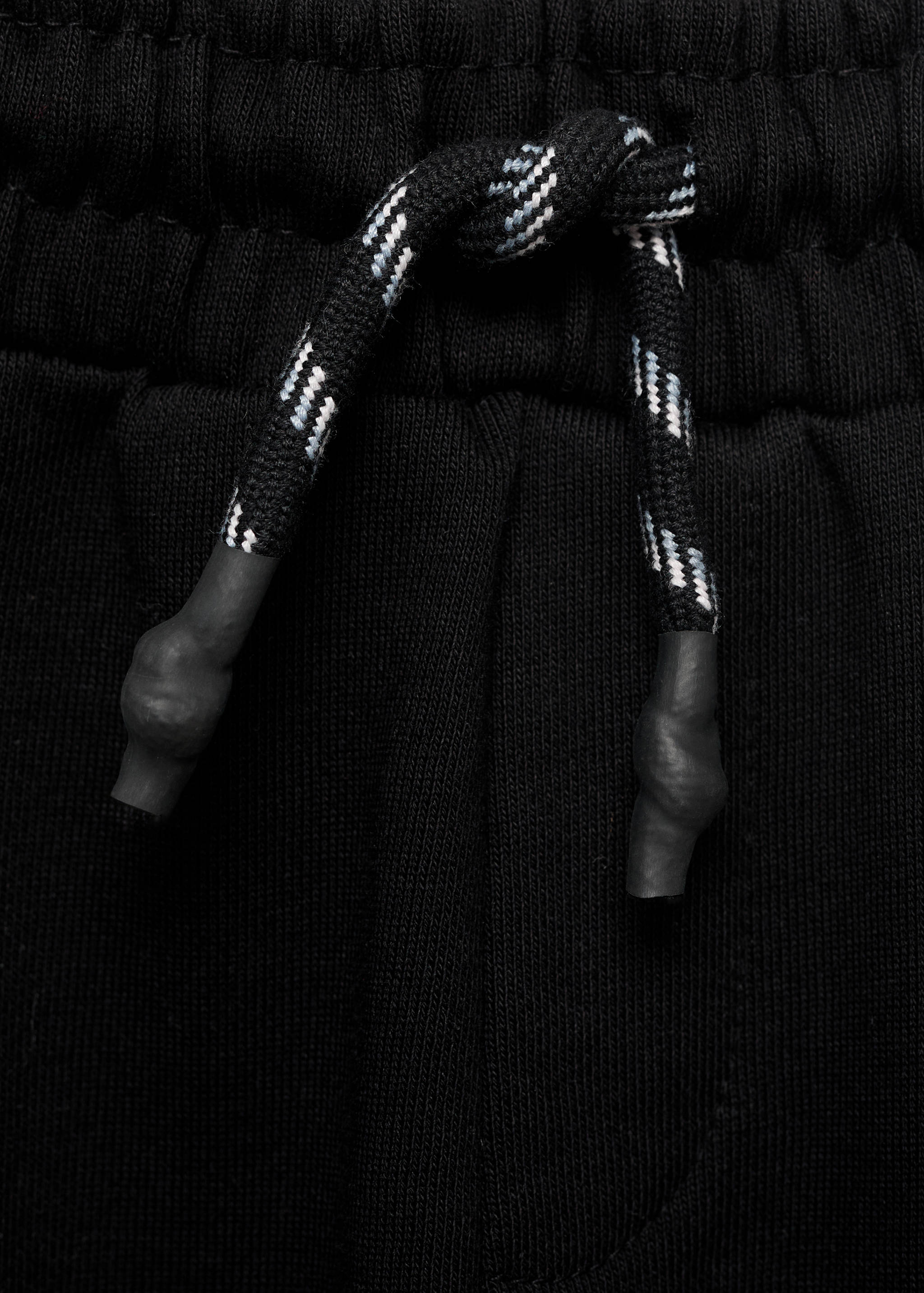 Spodnie joggersy ze sznurkiem - Szczegóły artykułu 8