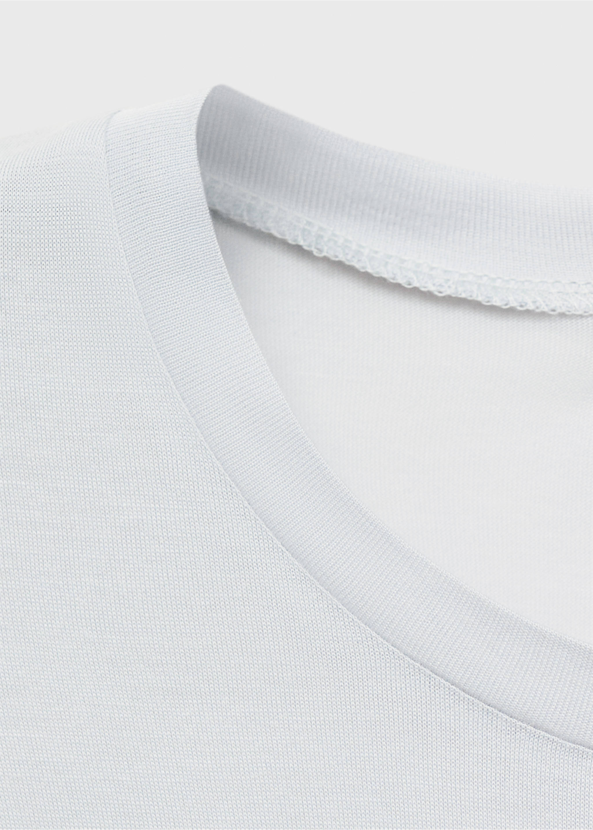 Close-up of a white pajama T-shirt neckline with a ribbed crew collar., Light/Pastel Grey. Ref: 17034105-00.