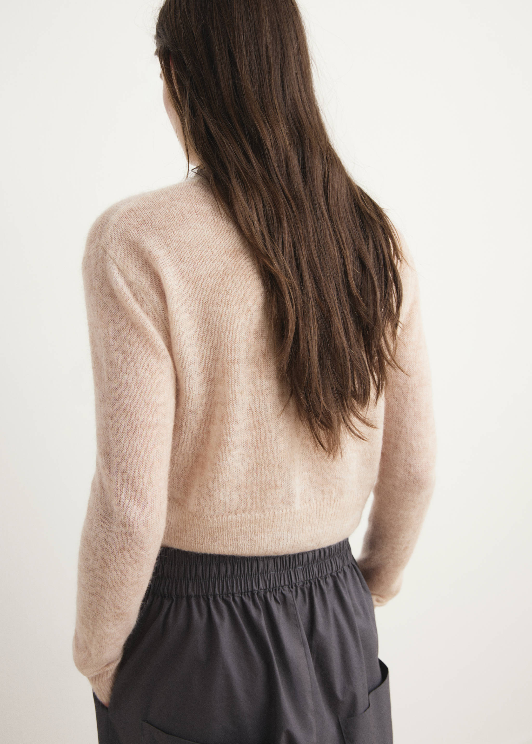 Short wool cardigan - Reverse of the article