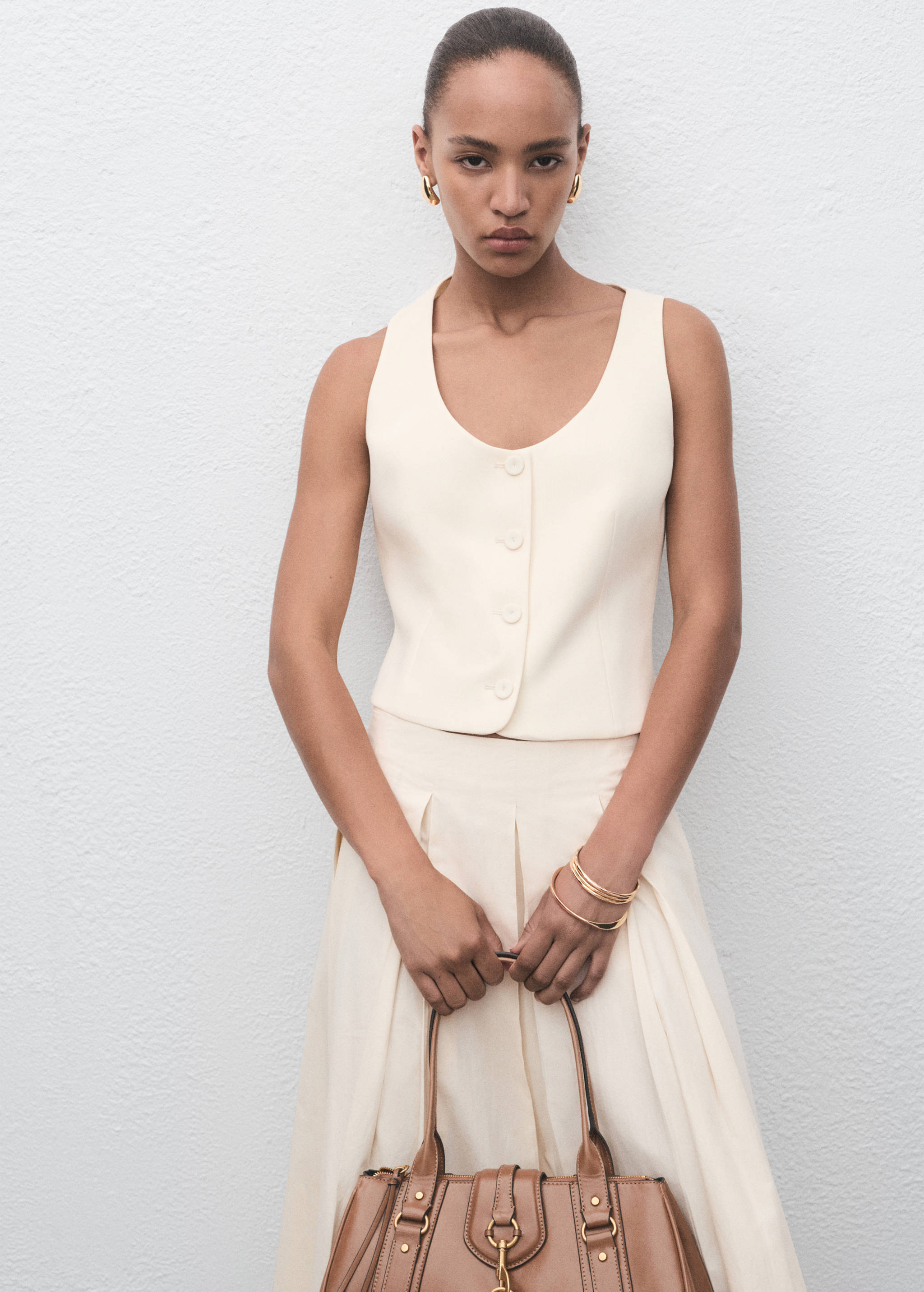 Colete de fato com botões - Plano médio