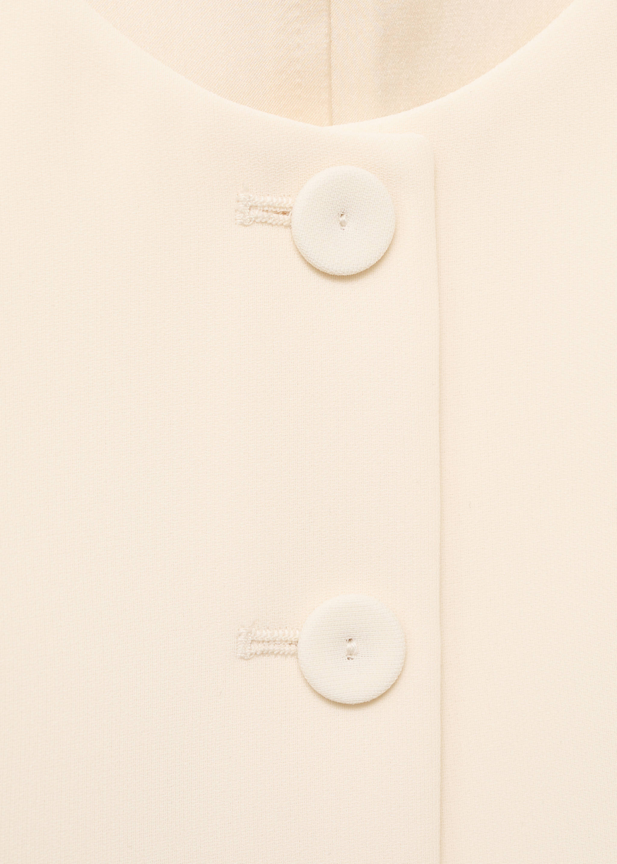 Colete de fato com botões - Pormenor do artigo 8