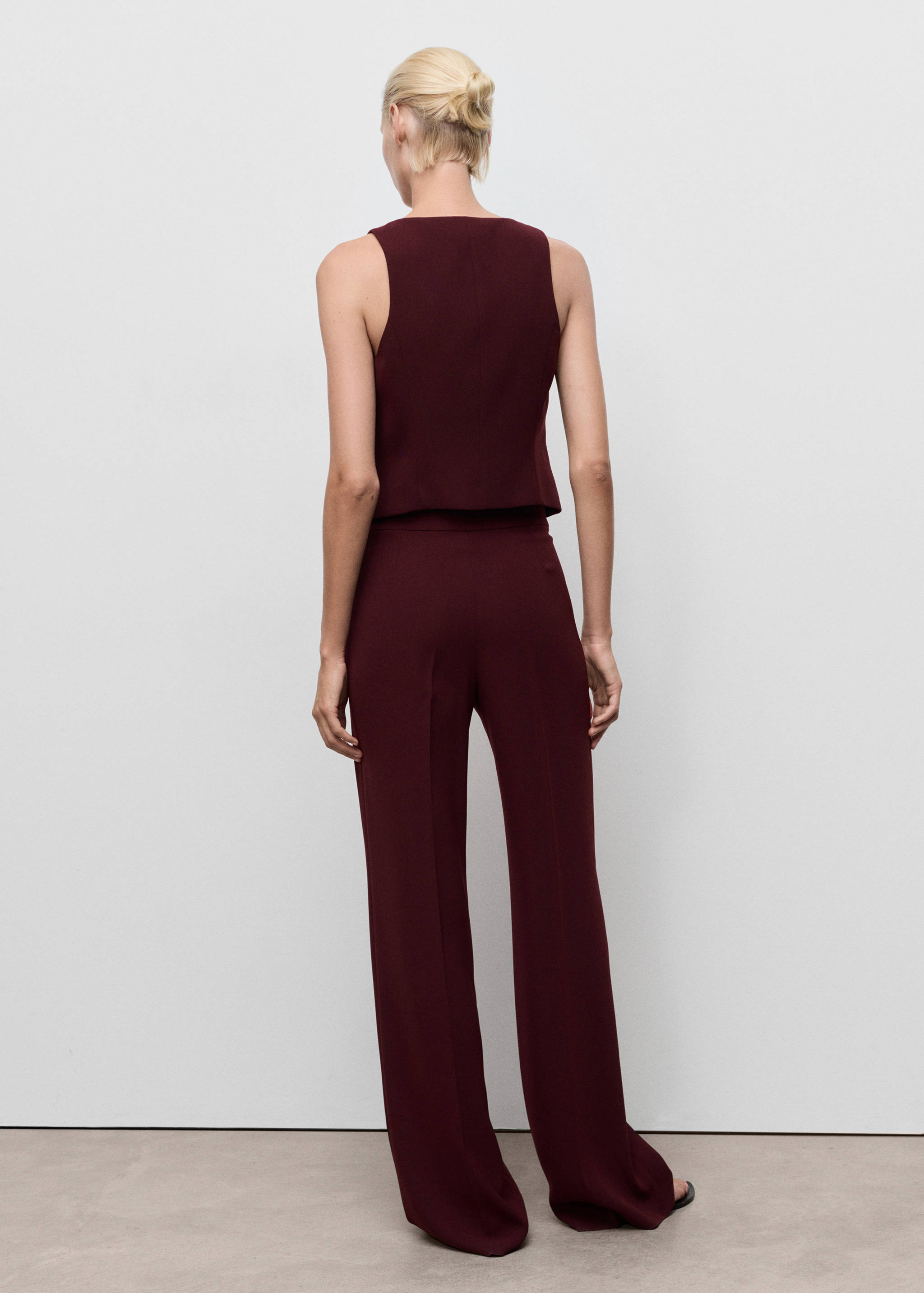 Colete de fato com botões - Verso do artigo