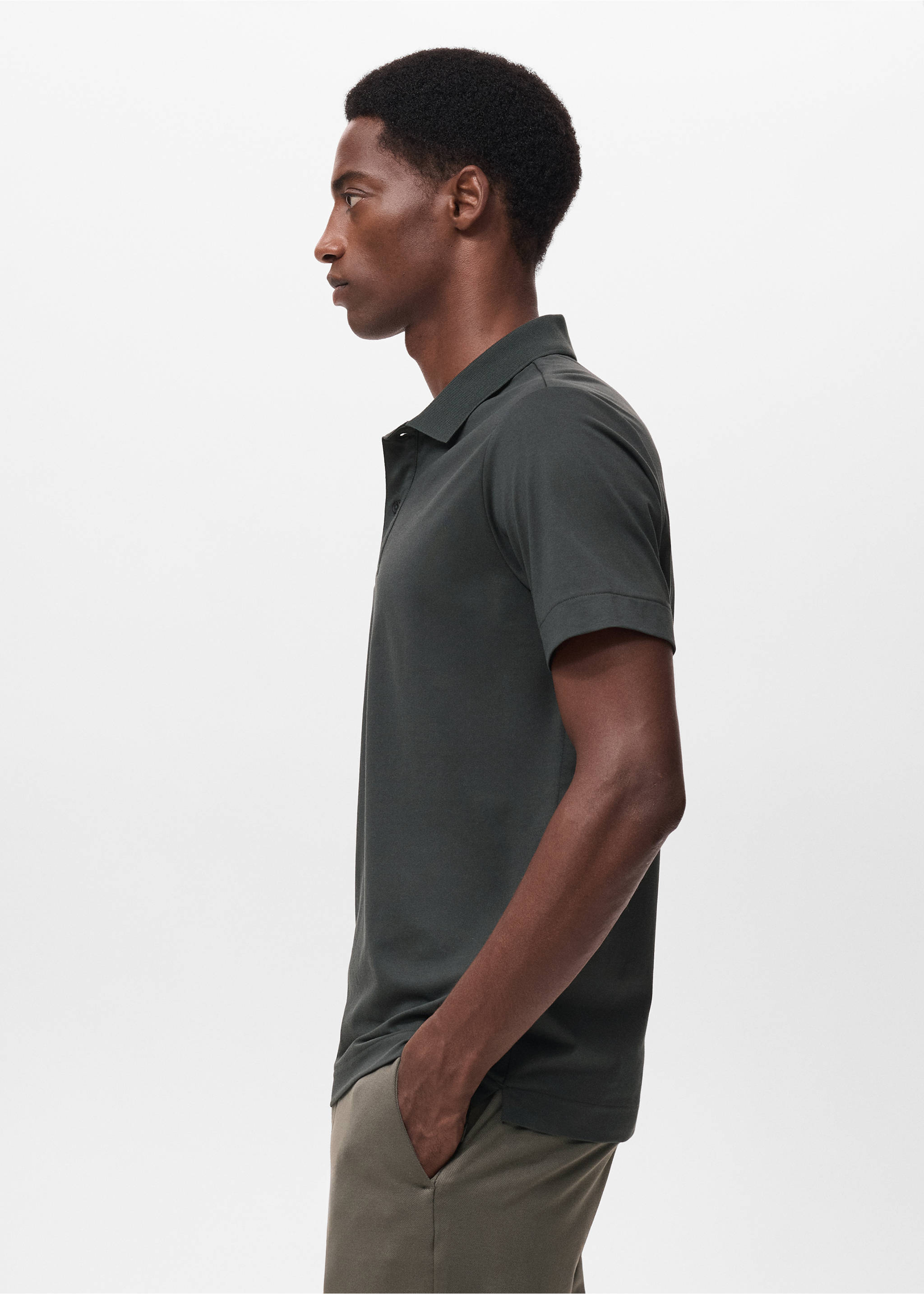 Slim-fit Thermolite® polo shirt - Details of the article 2, Dark Green. Ref: 17035977-00.