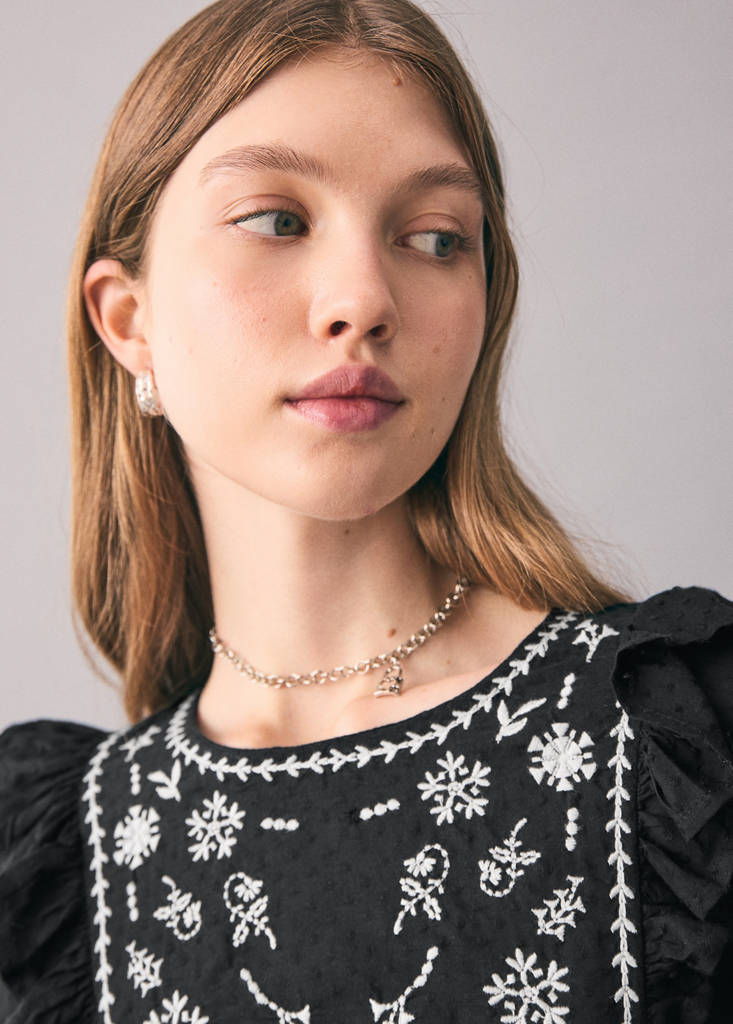 Ruffled embroidered blouse — Black