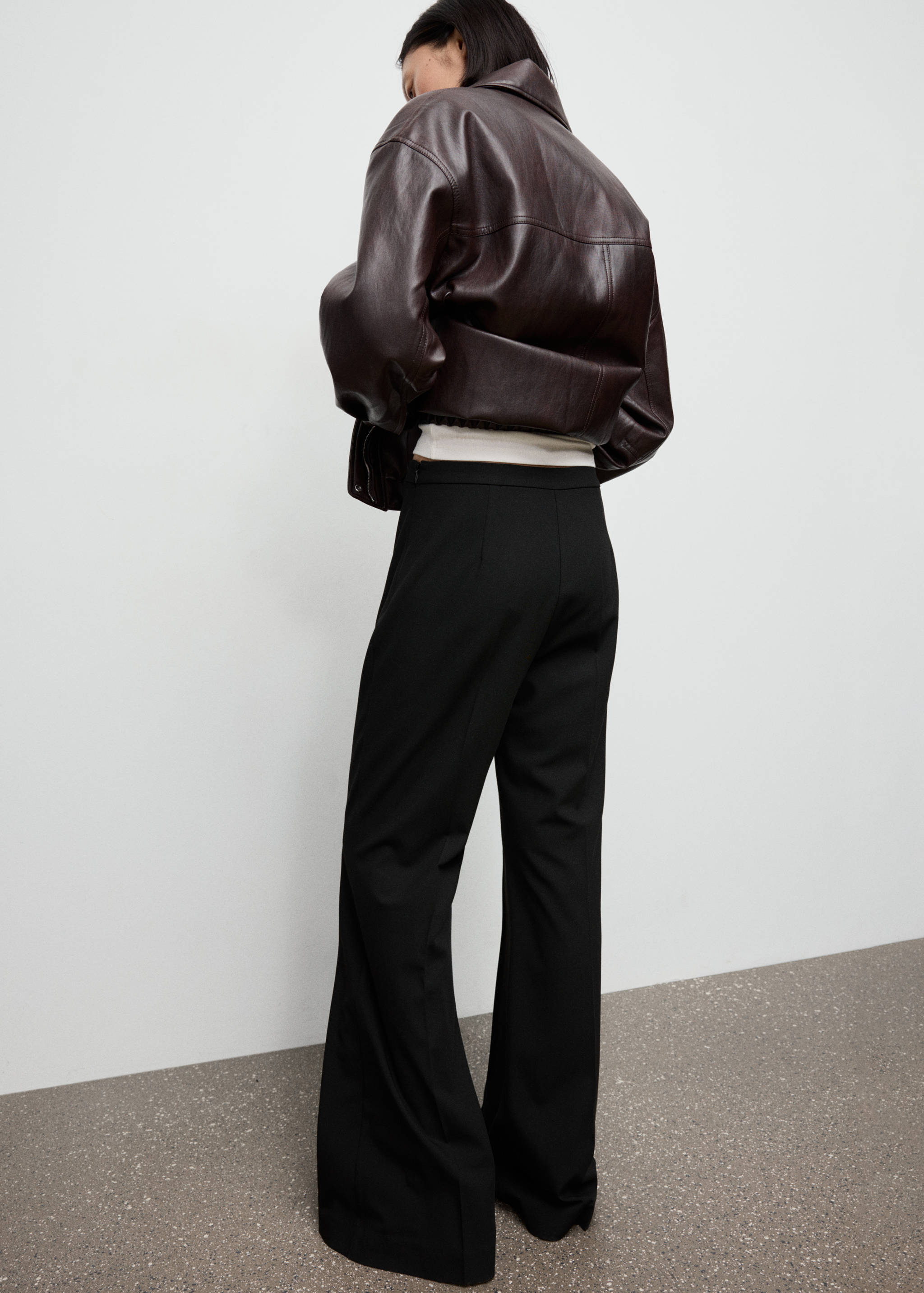 High-waisted flared trousers - Reverse of the article