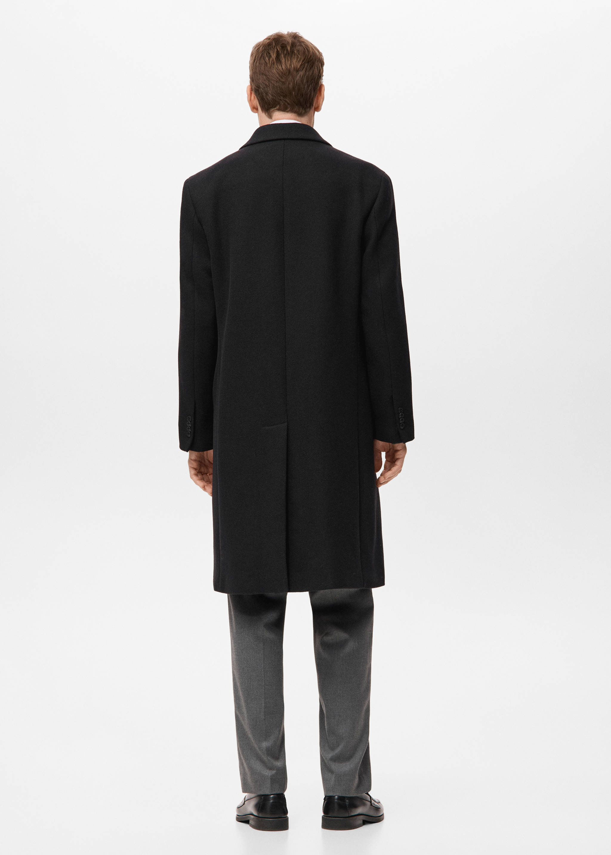 Long double-breasted wool coat - Reverse of the article