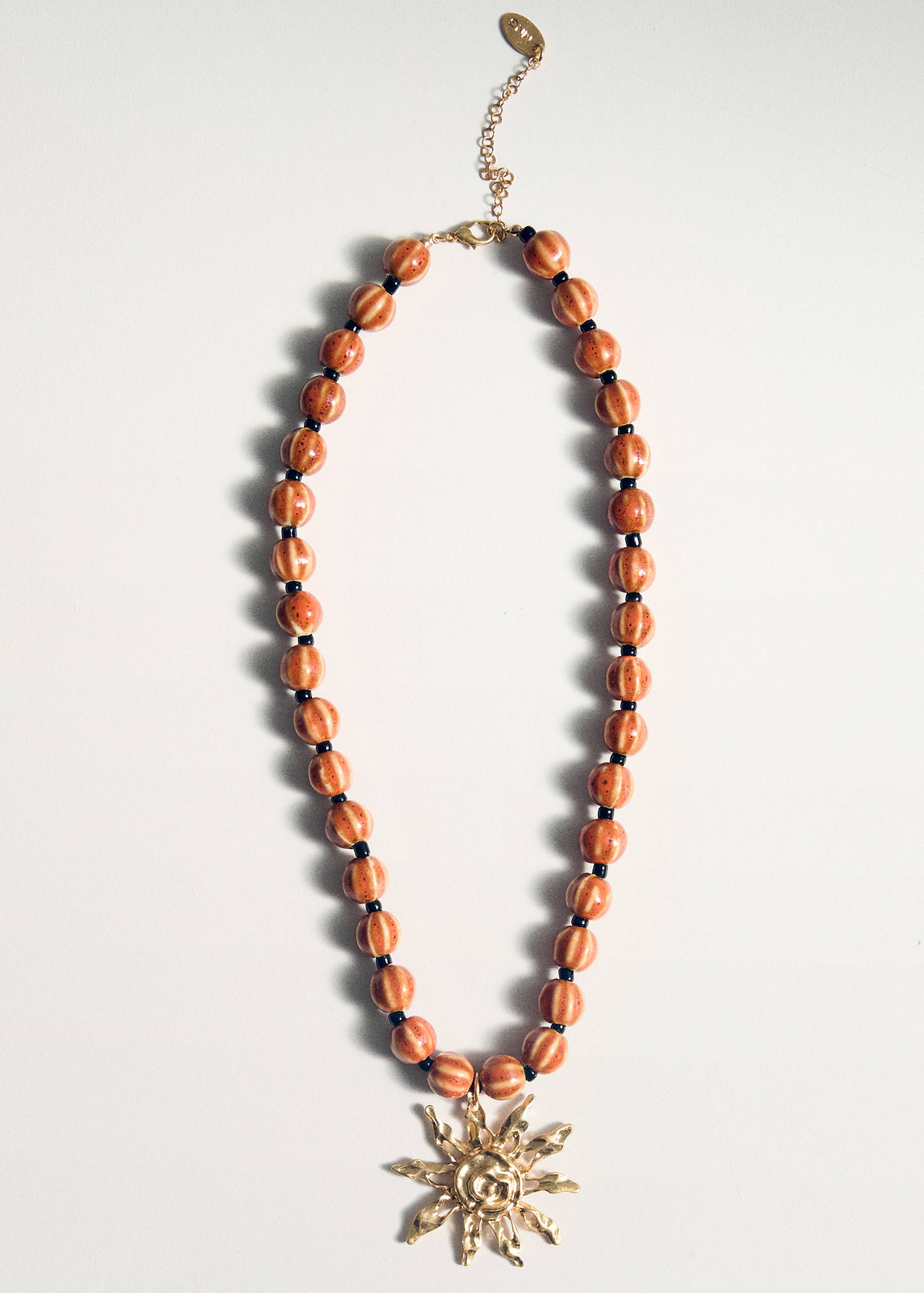 Collier boules en céramique avec pendentif soleil - Détail de l'article 5