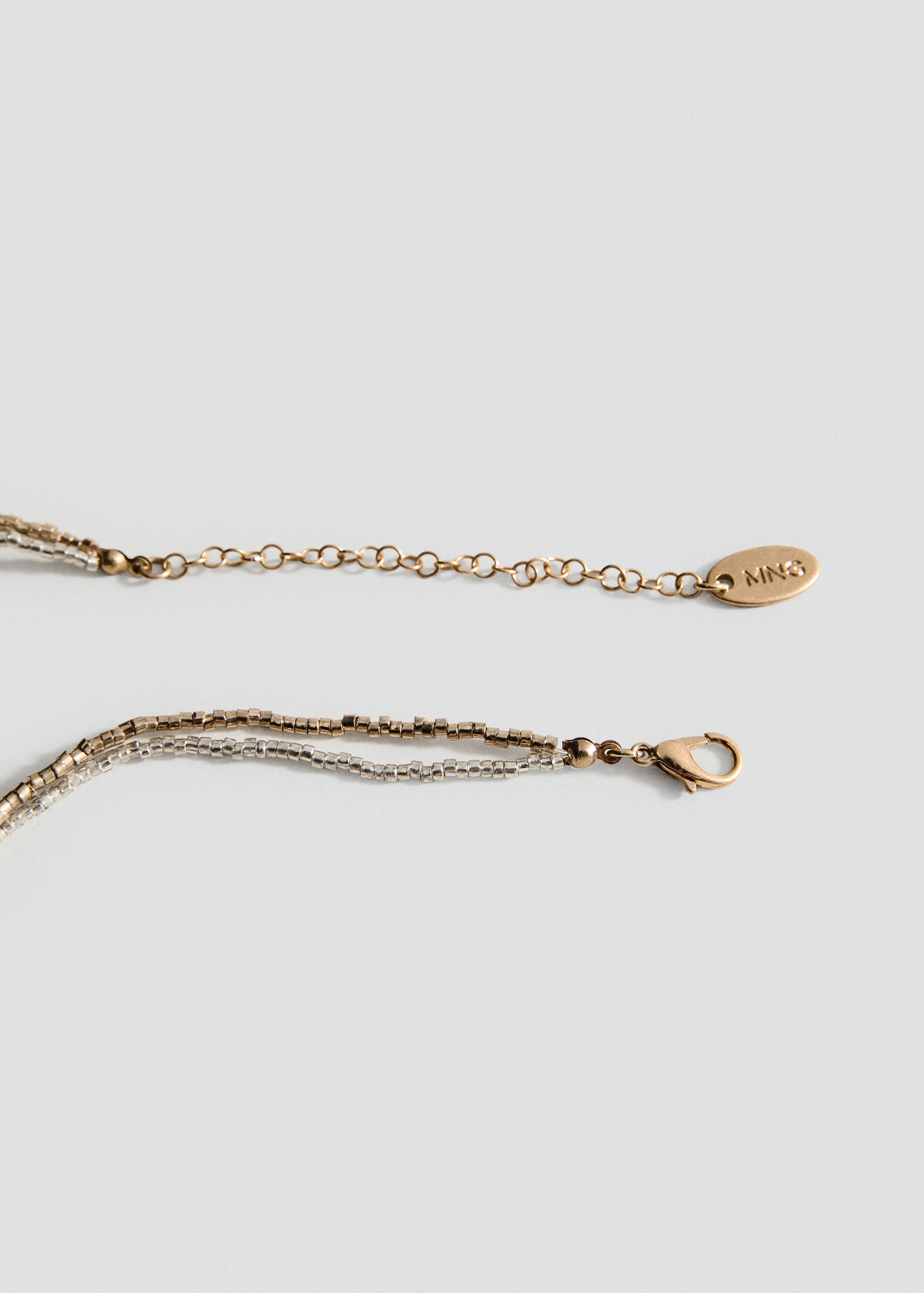 Colar duplo combinado - Pormenor do artigo 1