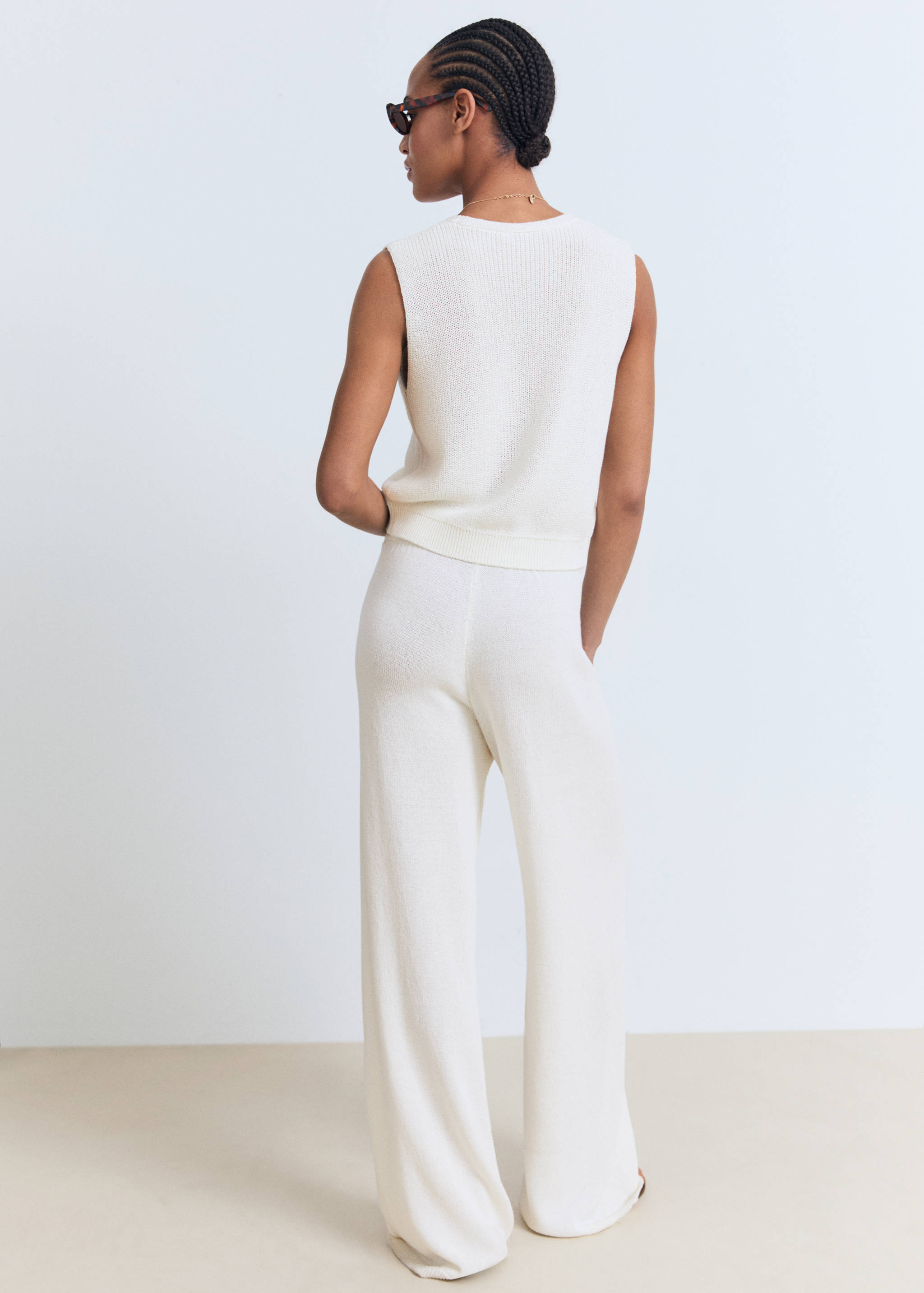 Openwork knitted trousers - Reverse of the article