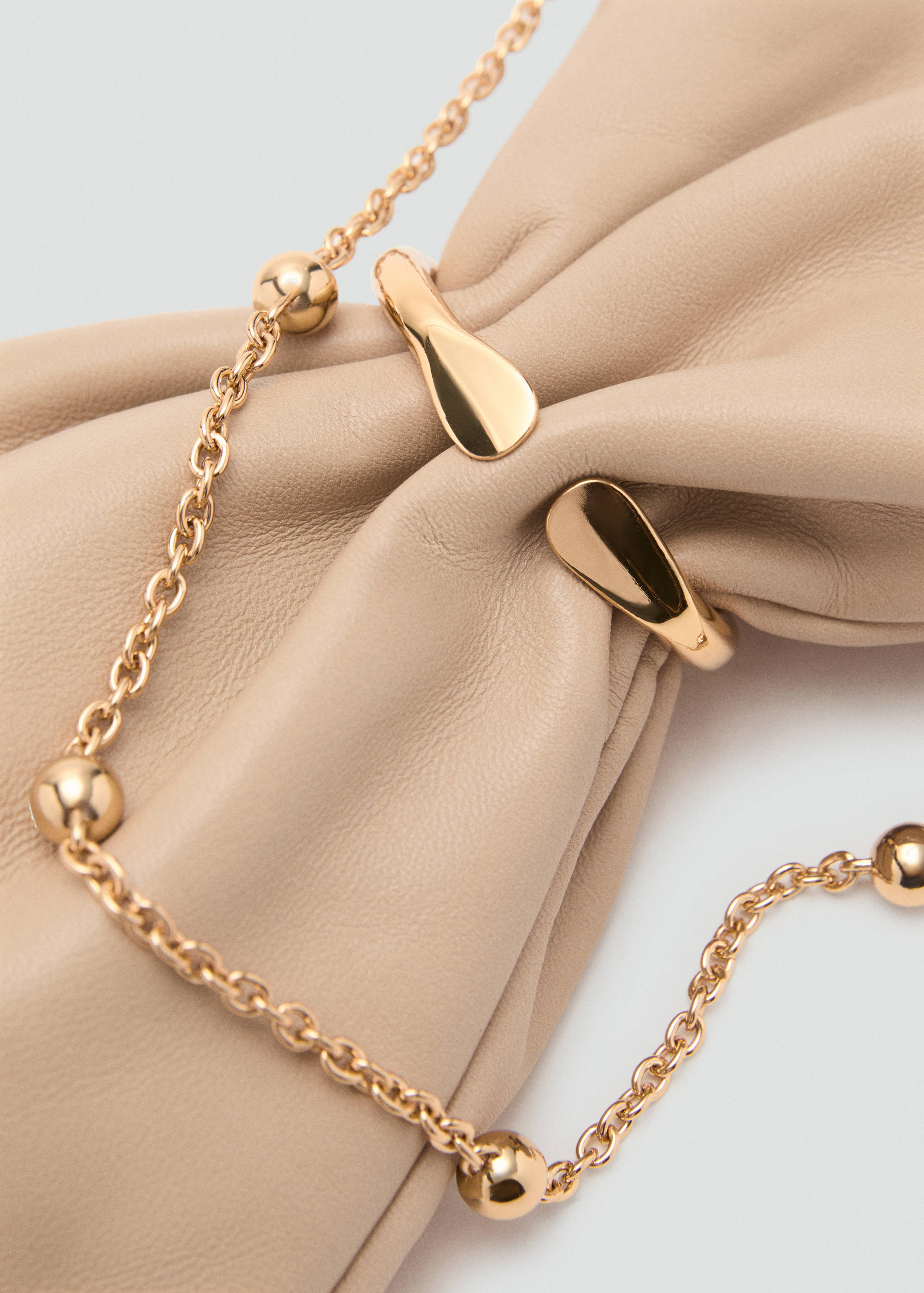 Leather sack-style bag with metallic detail - Details of the article 1