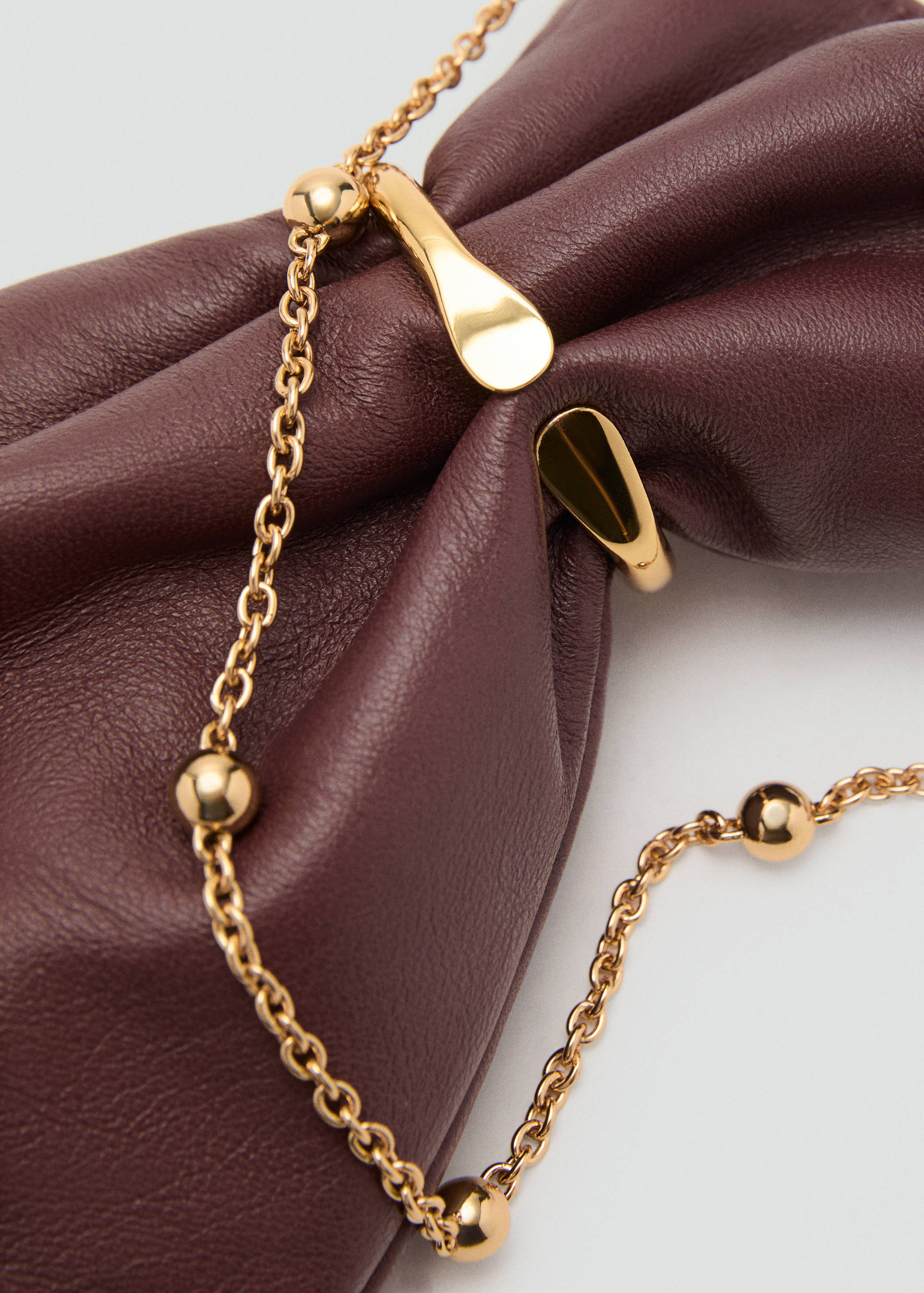 Leather sack-style bag with metallic detail - Details of the article 1