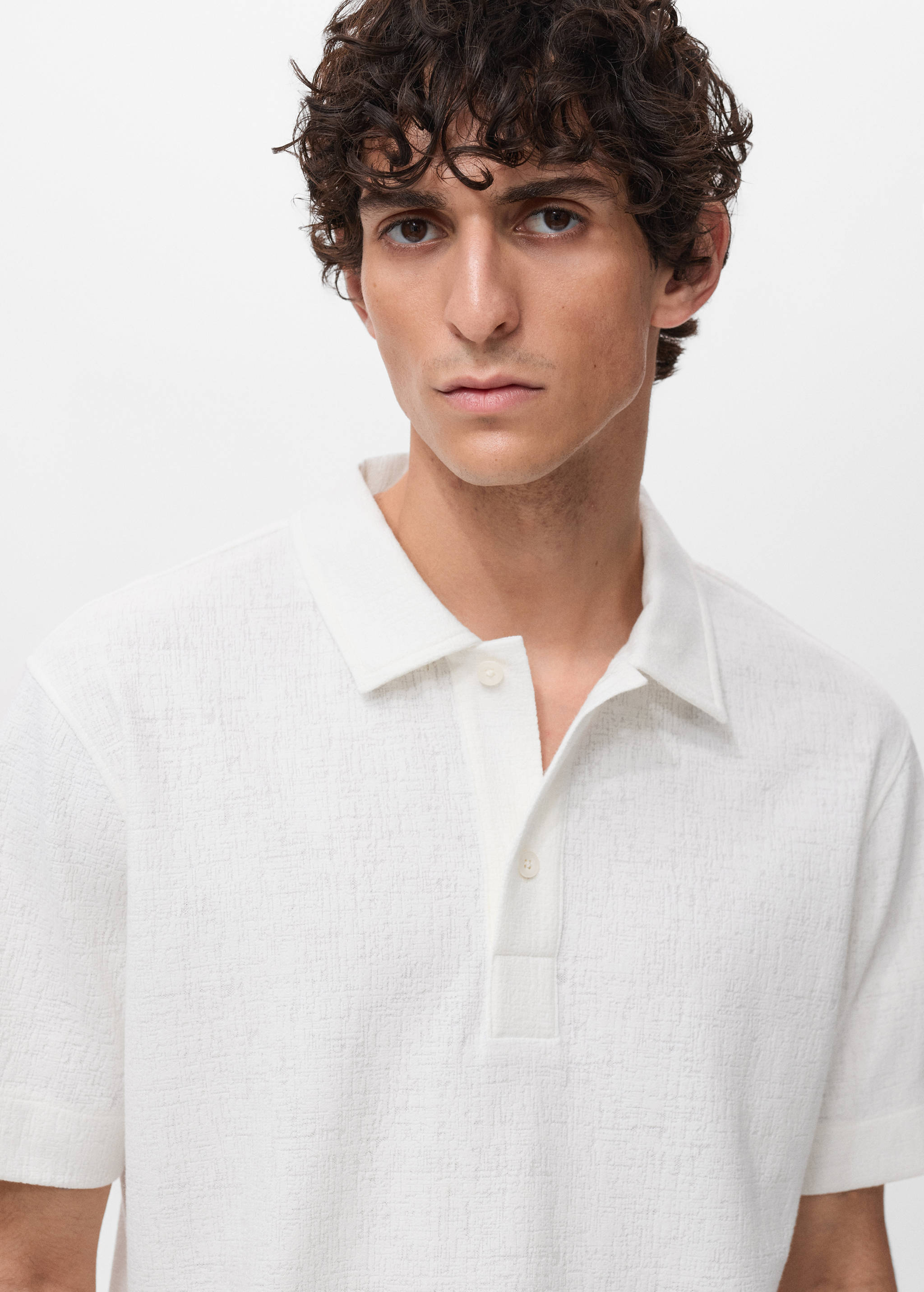 Structured knitted polo shirt - Details of the article 1