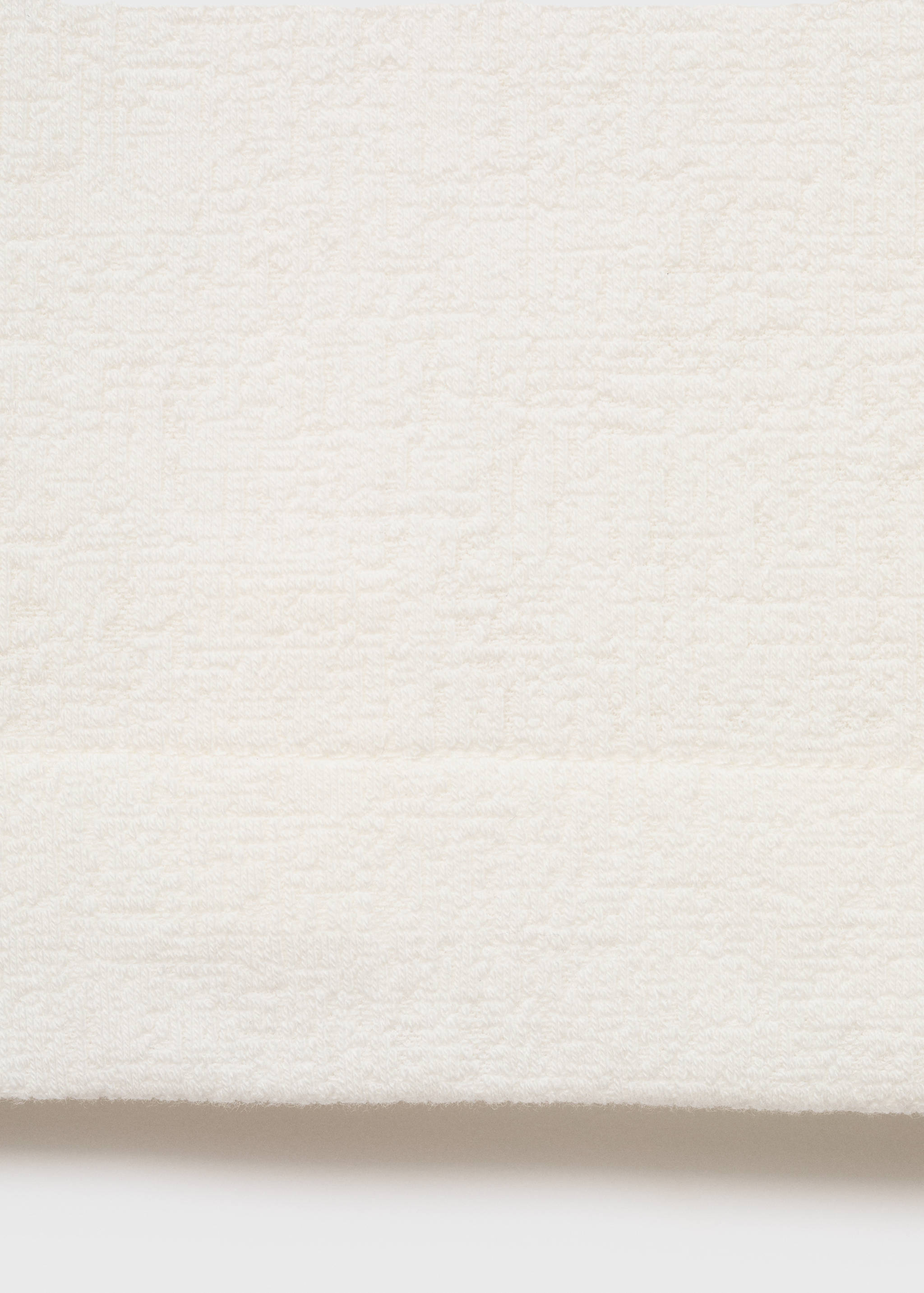 Structured knitted polo shirt - Details of the article 0