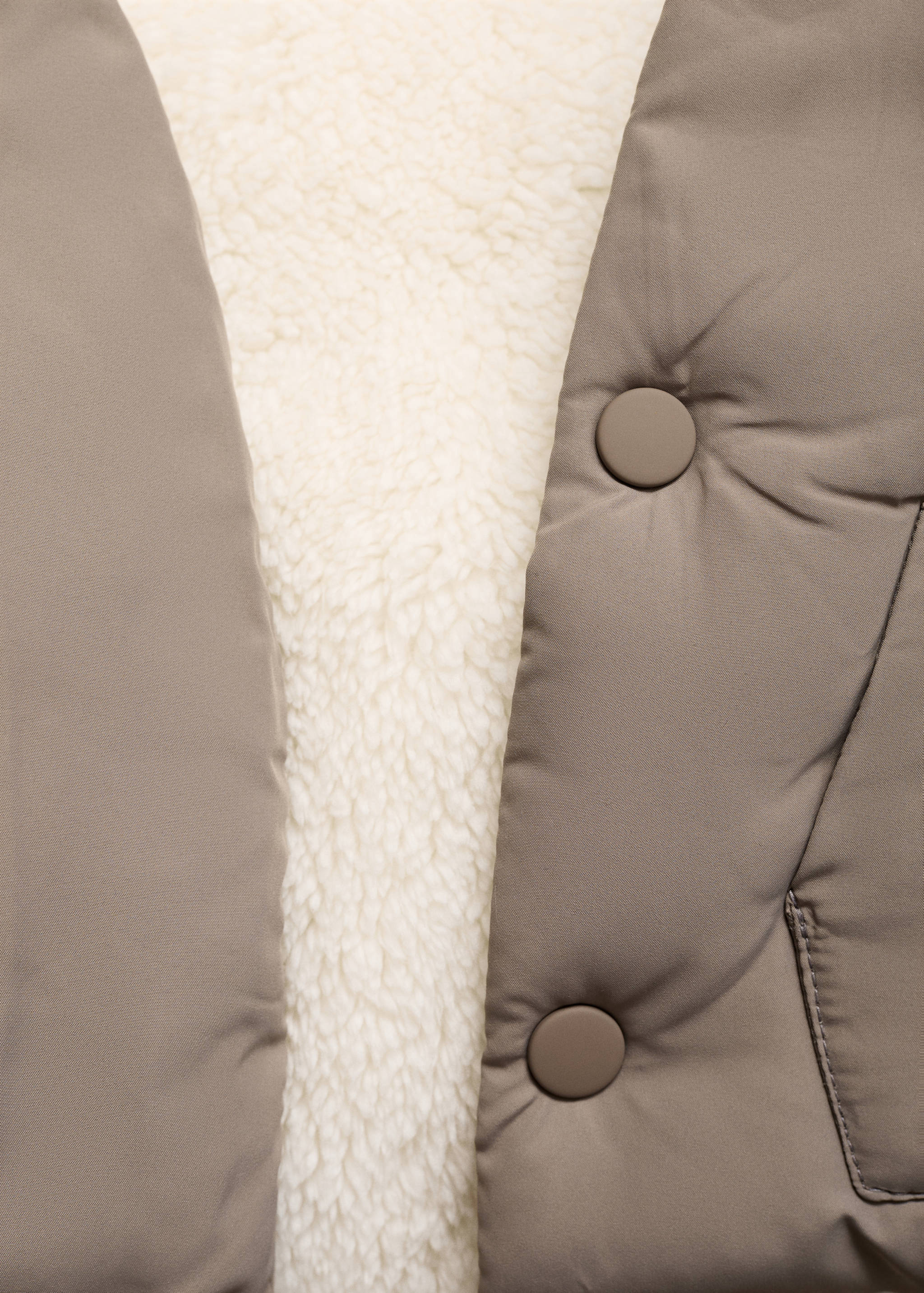 Quilted coat with ear flaps - Details of the article 8
