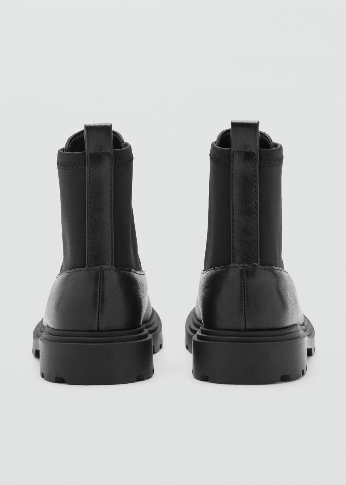 Zipped leather ankle boots — Black