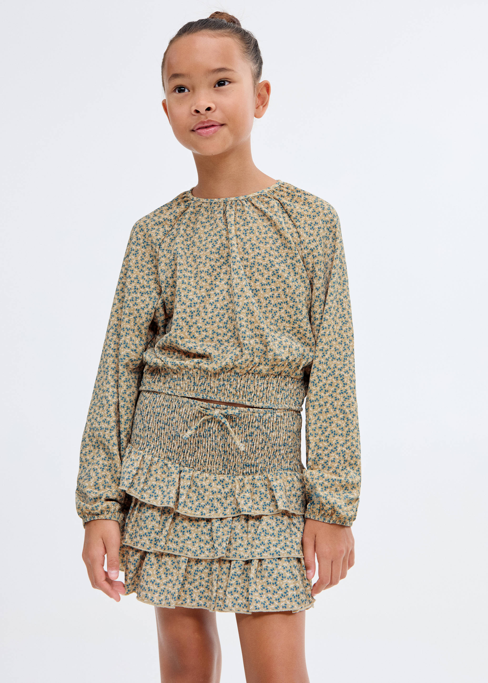 Falda flores evasé - Plano medio