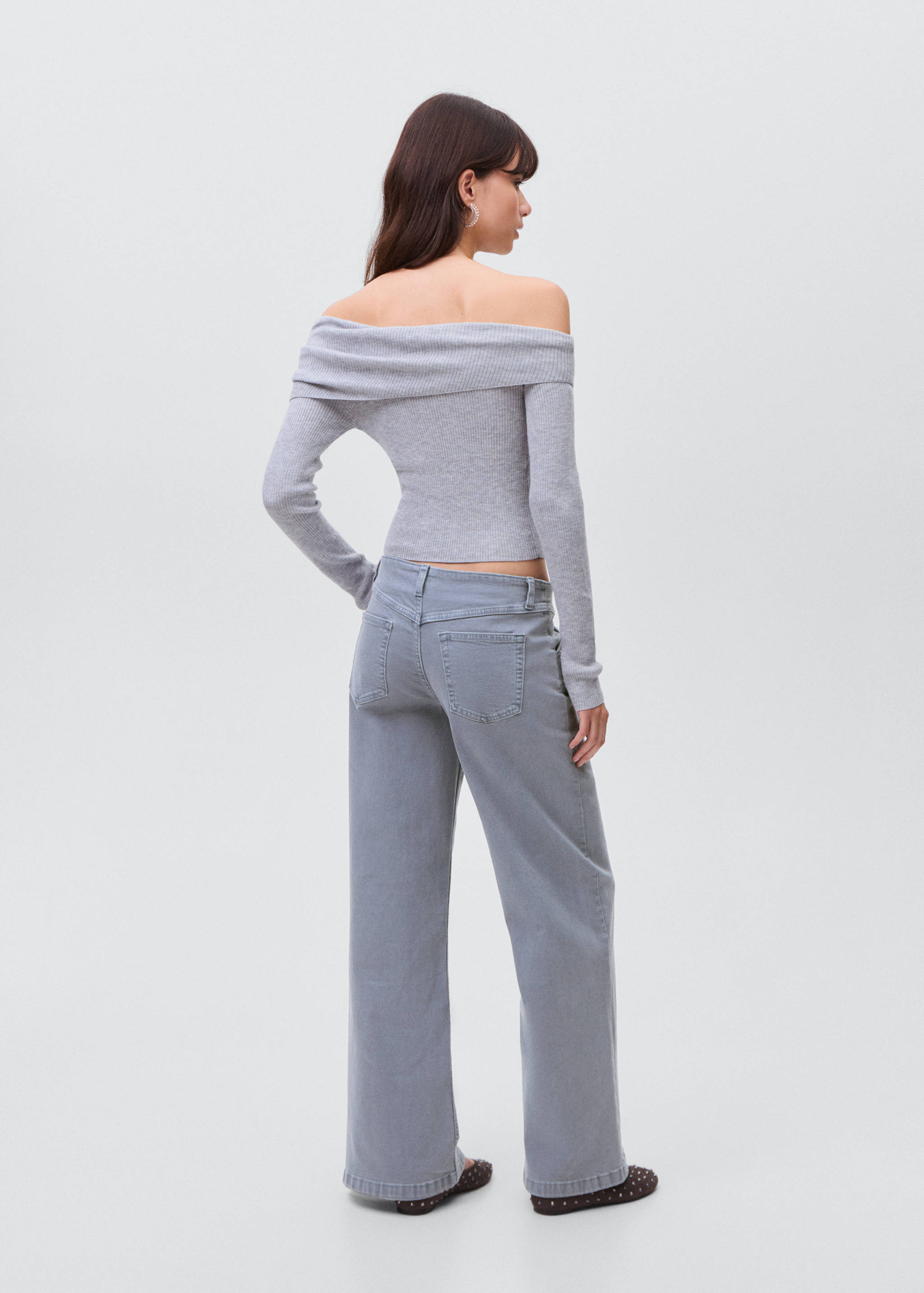 Low-waist studded jeans - Reverse of the article