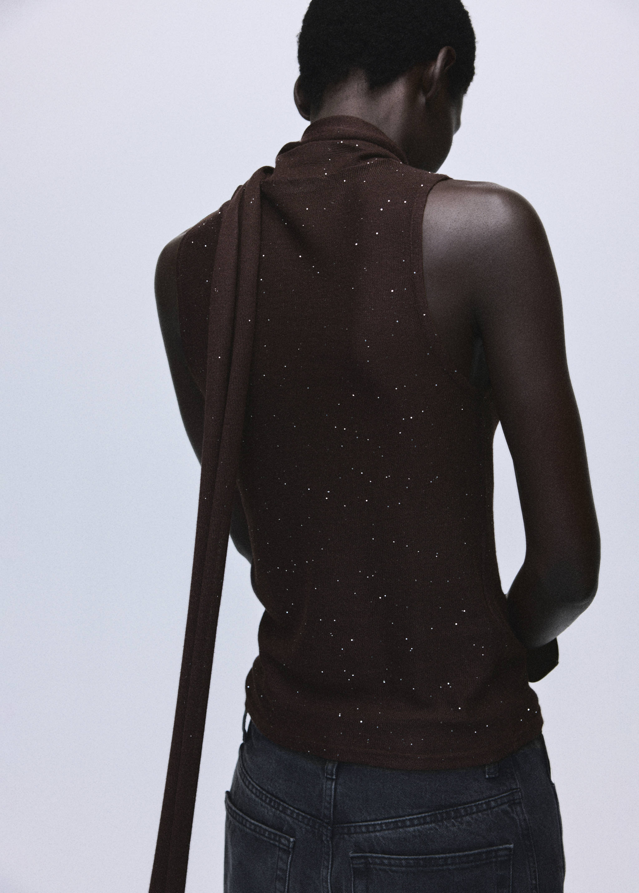 Top brillos fular - Reverso del artículo