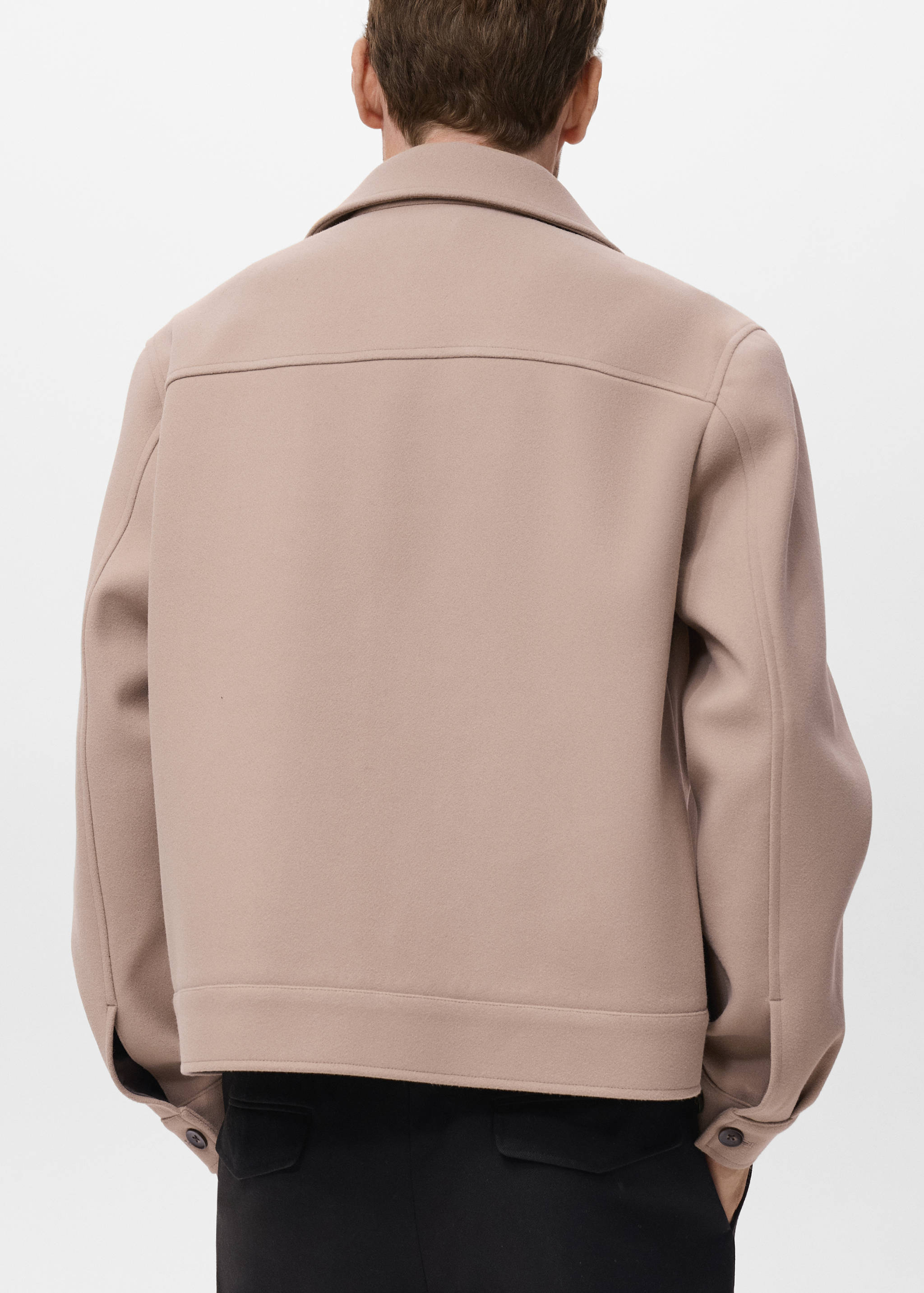 Cloth jacket with lapel pockets - Reverse of the article