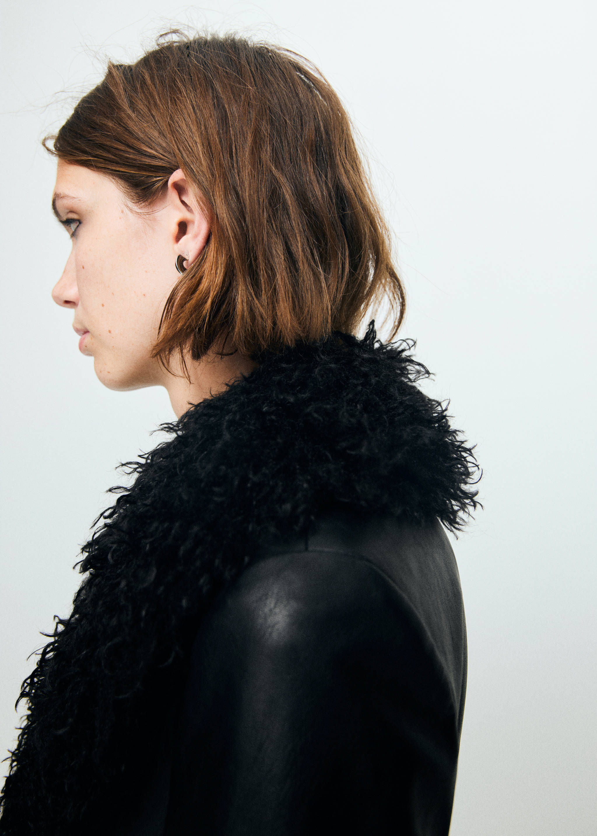 Faux-leather coat with fur trim - Details of the article 1
