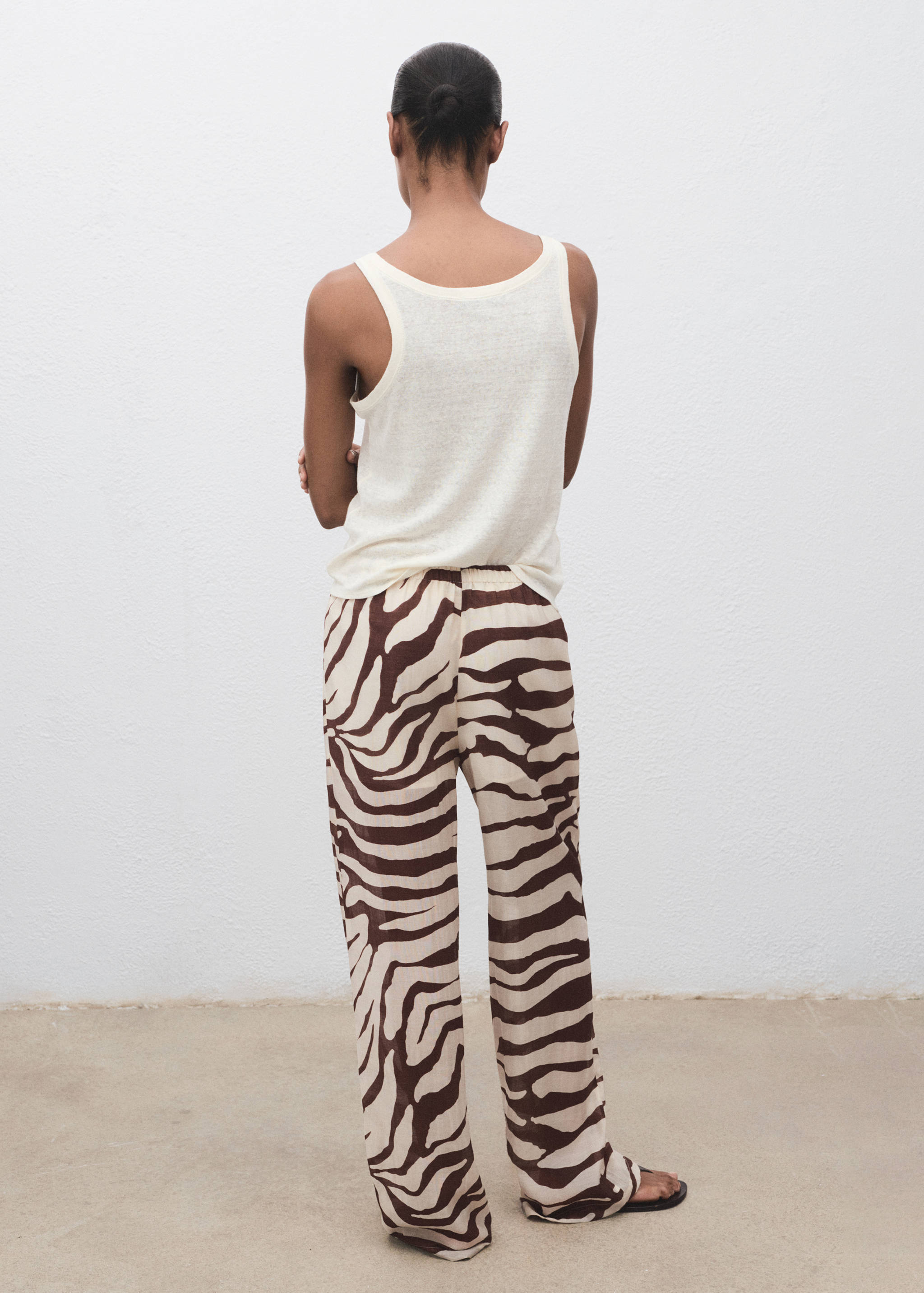 Zebra-print fluid trousers - Reverse of the article