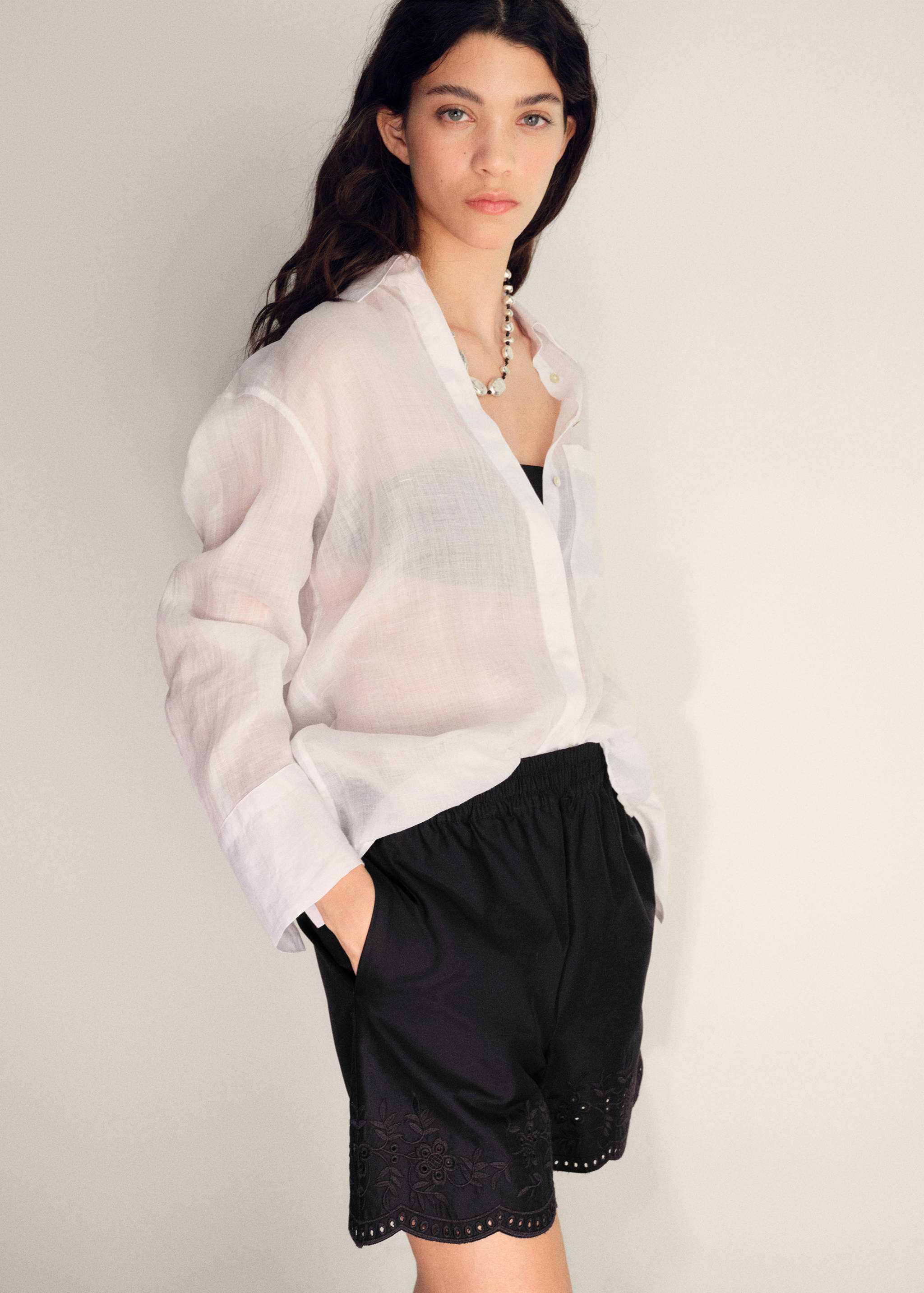 Satin shorts with embroidered hem - Details of the article 1