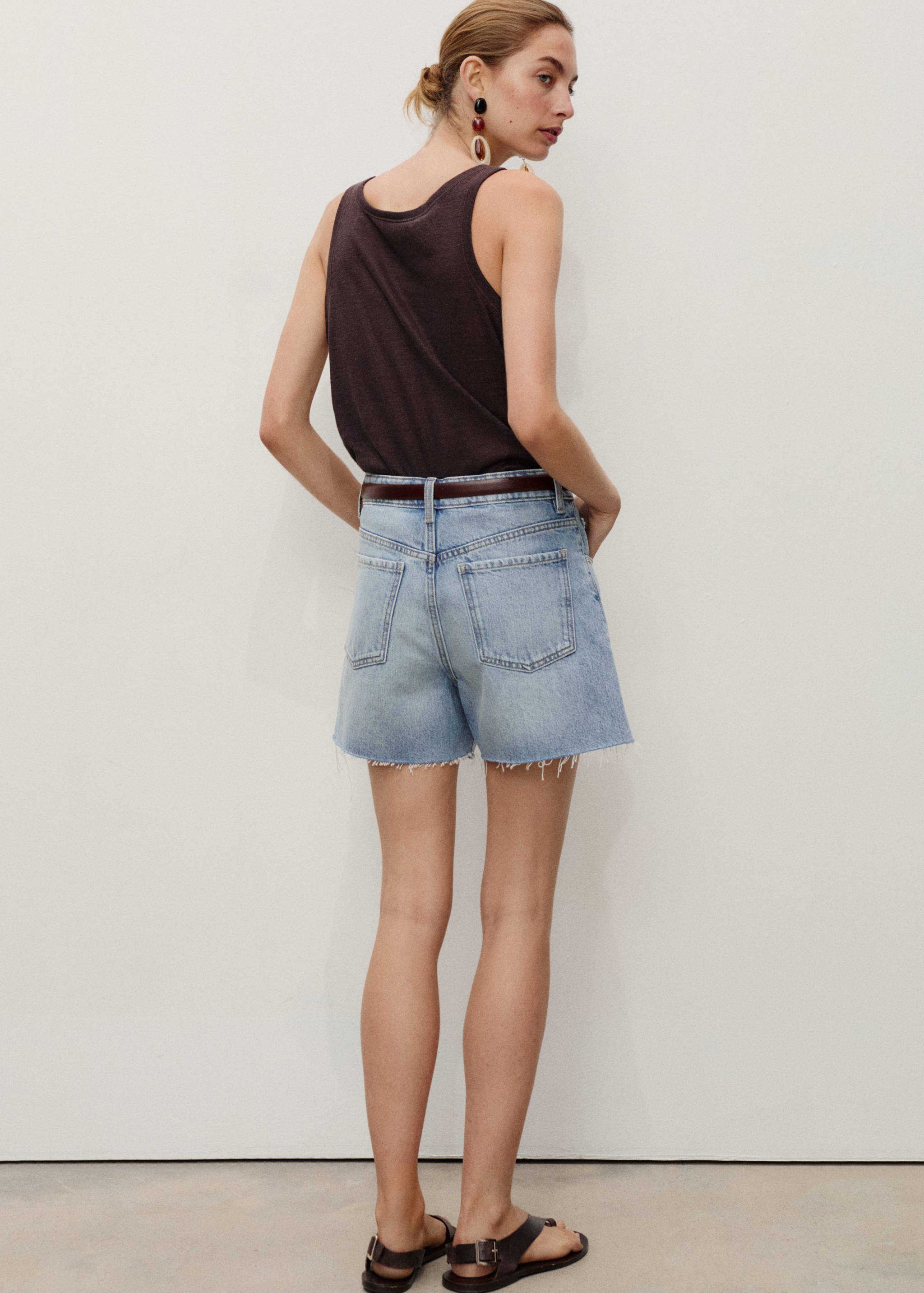 Denim shorts with frayed hem - Reverse of the article