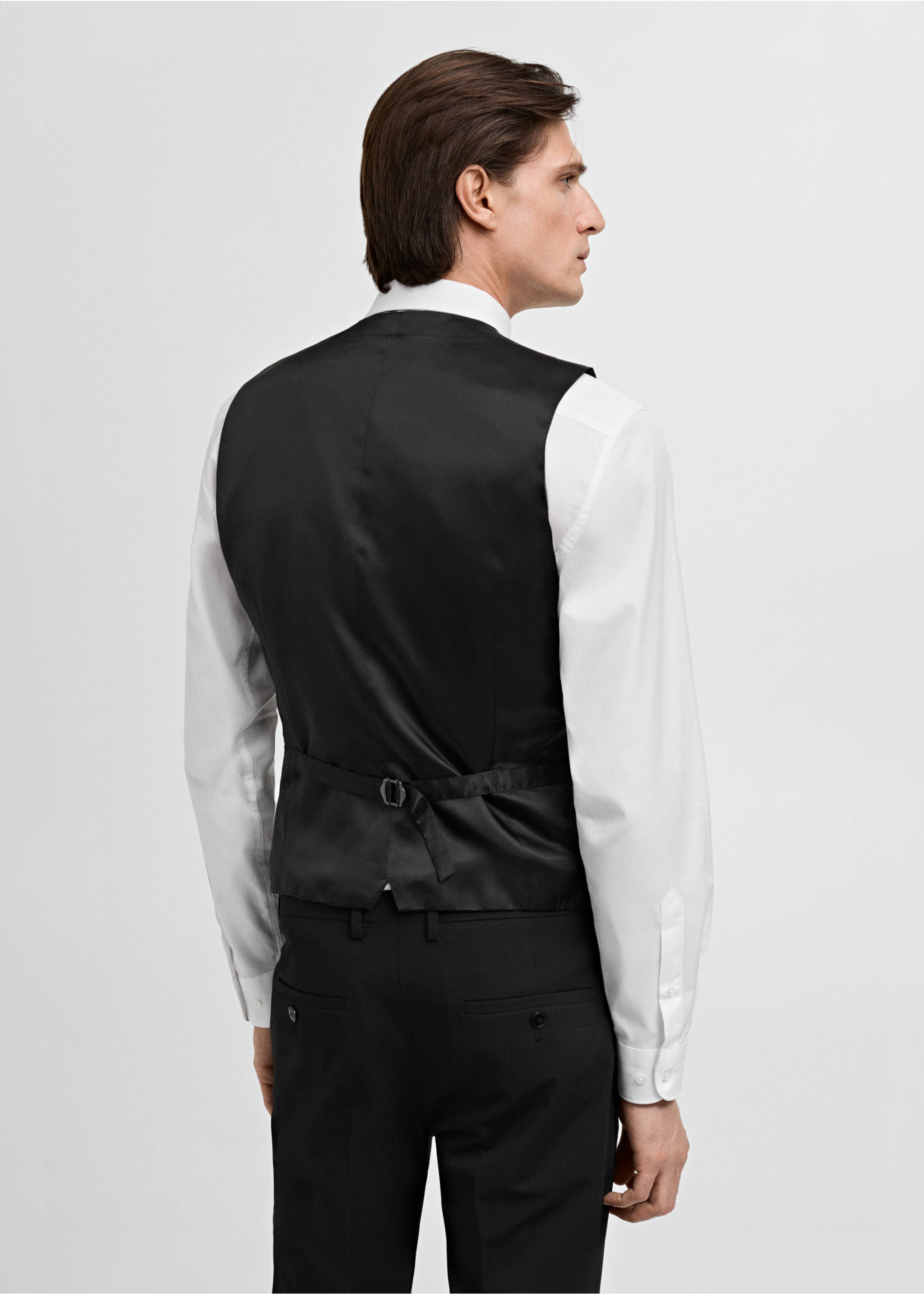 Black waistcoat with an adjustable back strap, back view, Black. Ref: 17051236-00.