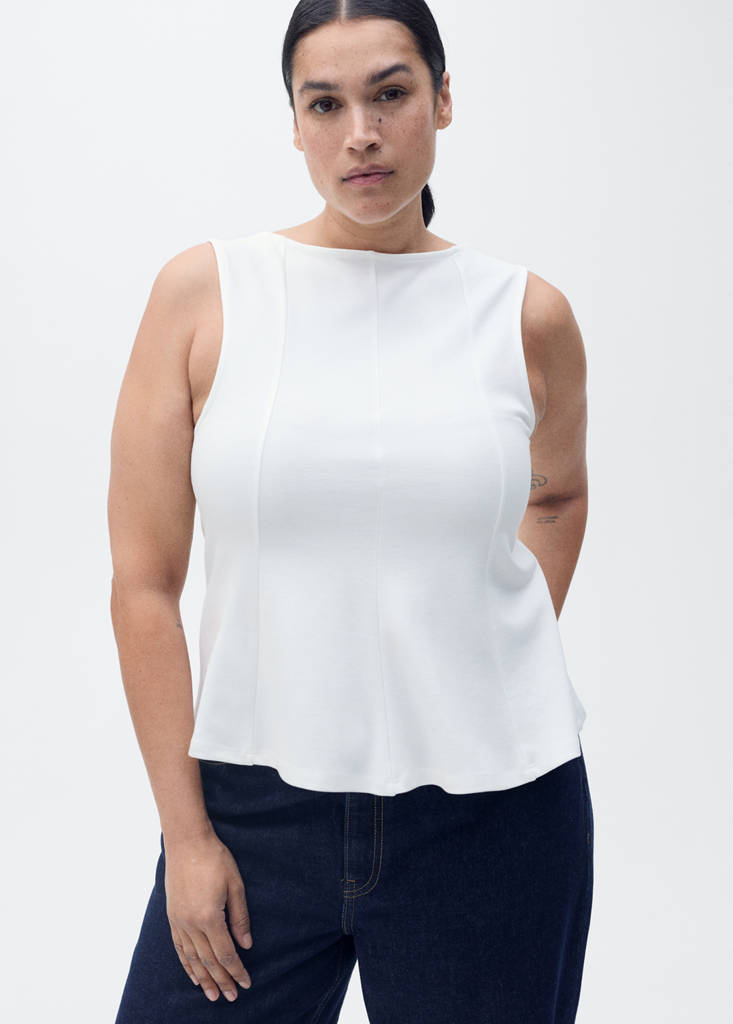 Peplum top with seam detail — White