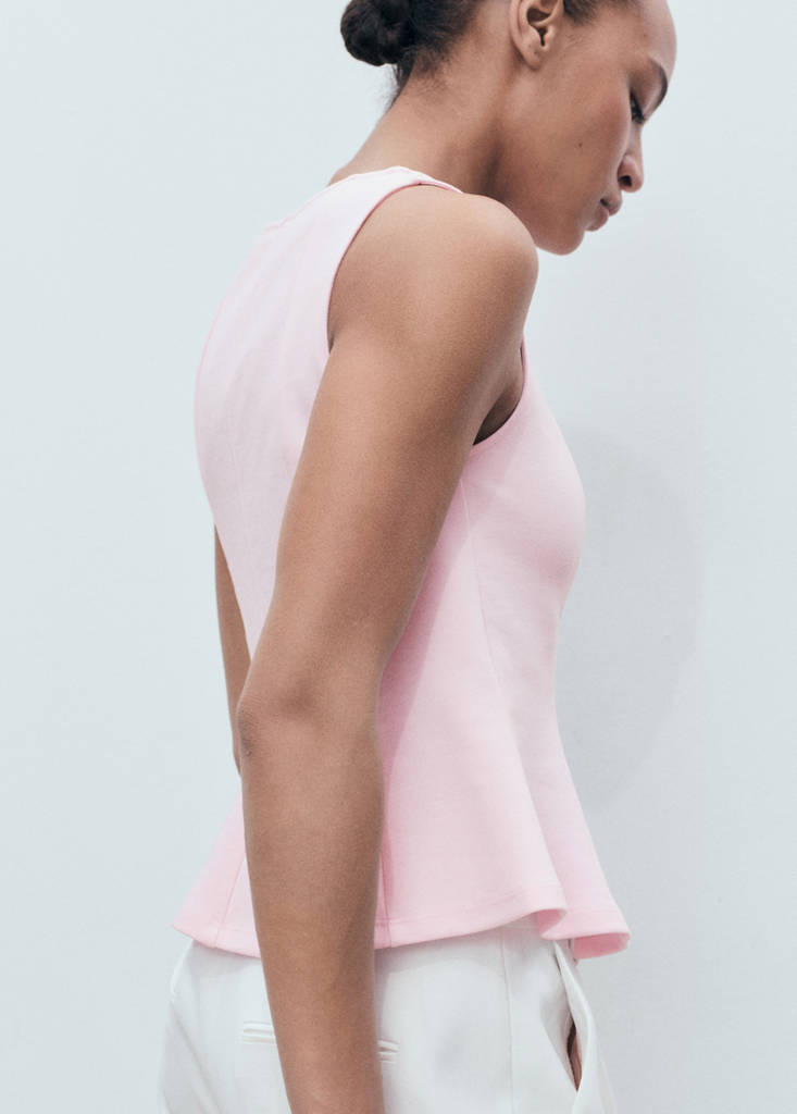 Peplum top with seam detail — Pastel Pink