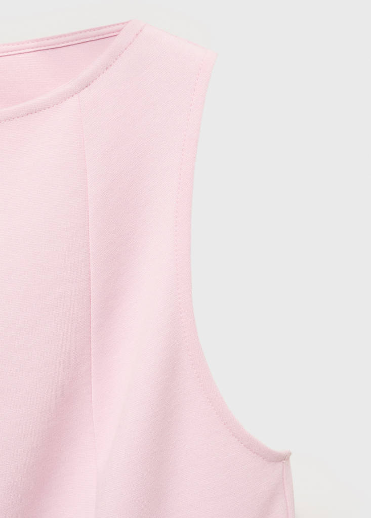 Peplum top with seam detail — Pastel Pink
