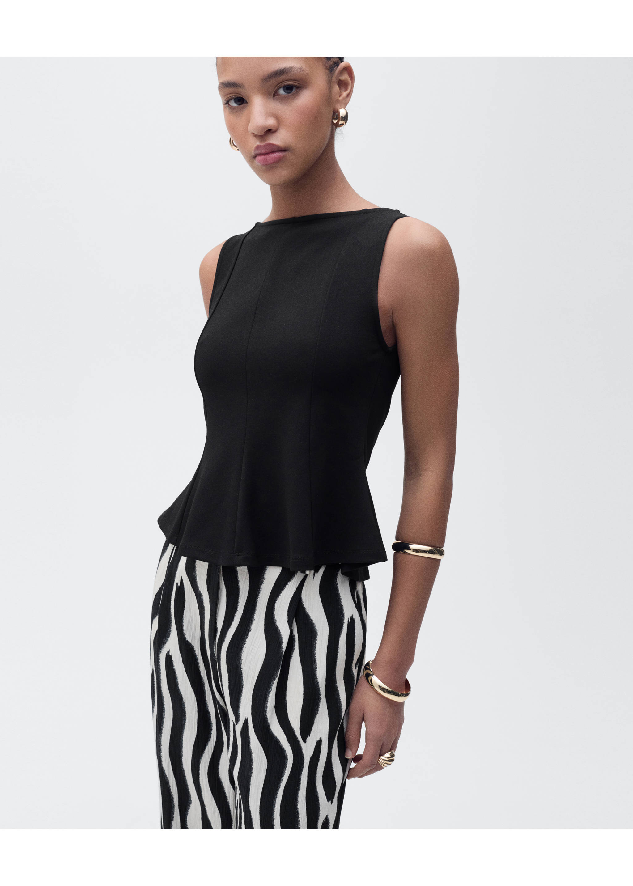 Peplum top with seam detail - Details of the article 1, Black. Ref: 17051268-00.