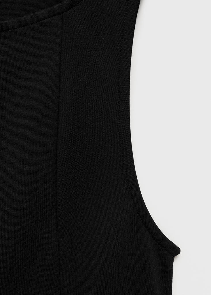 Peplum top with seam detail — Black