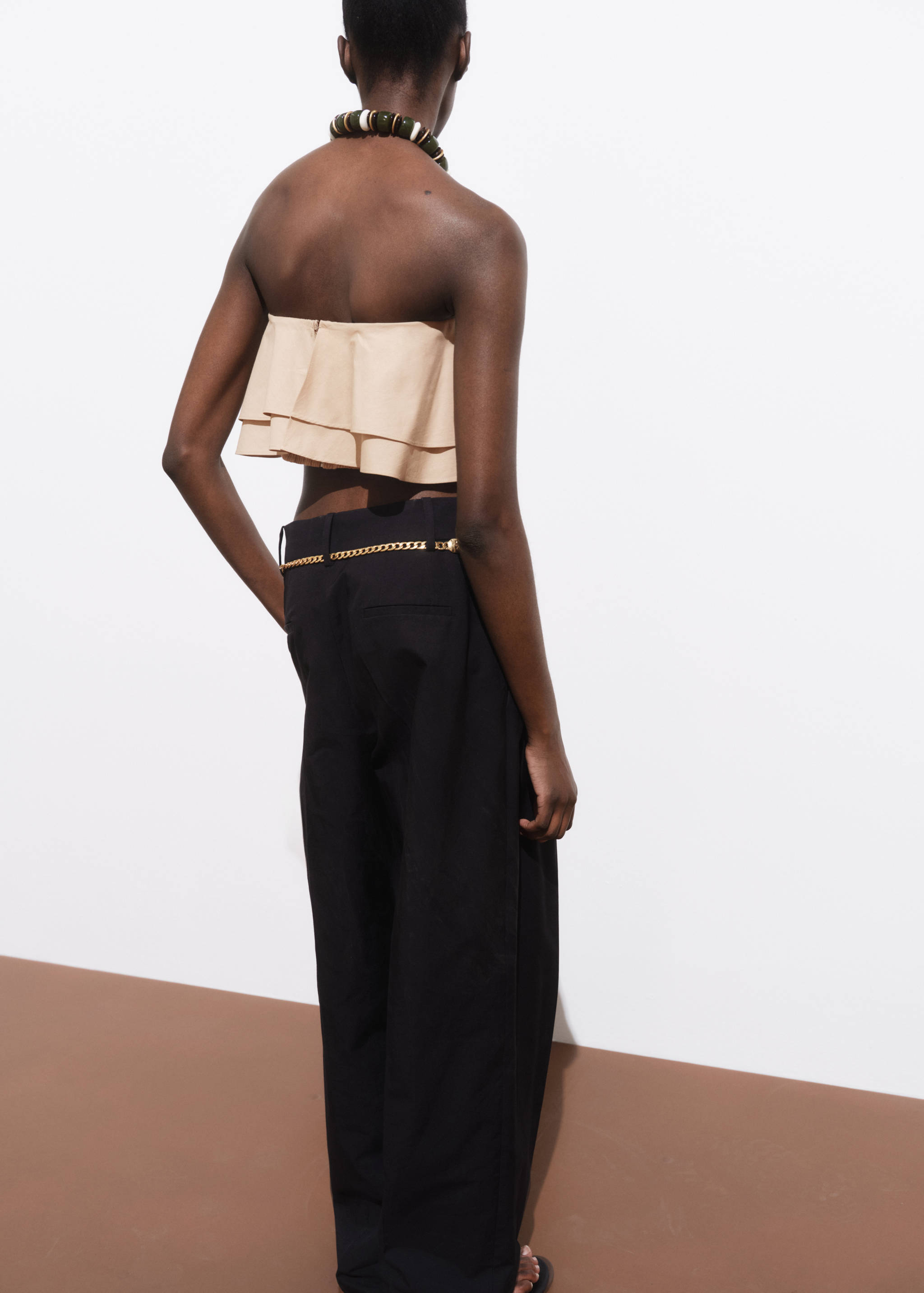 Strapless top with ruffles - Reverse of the article