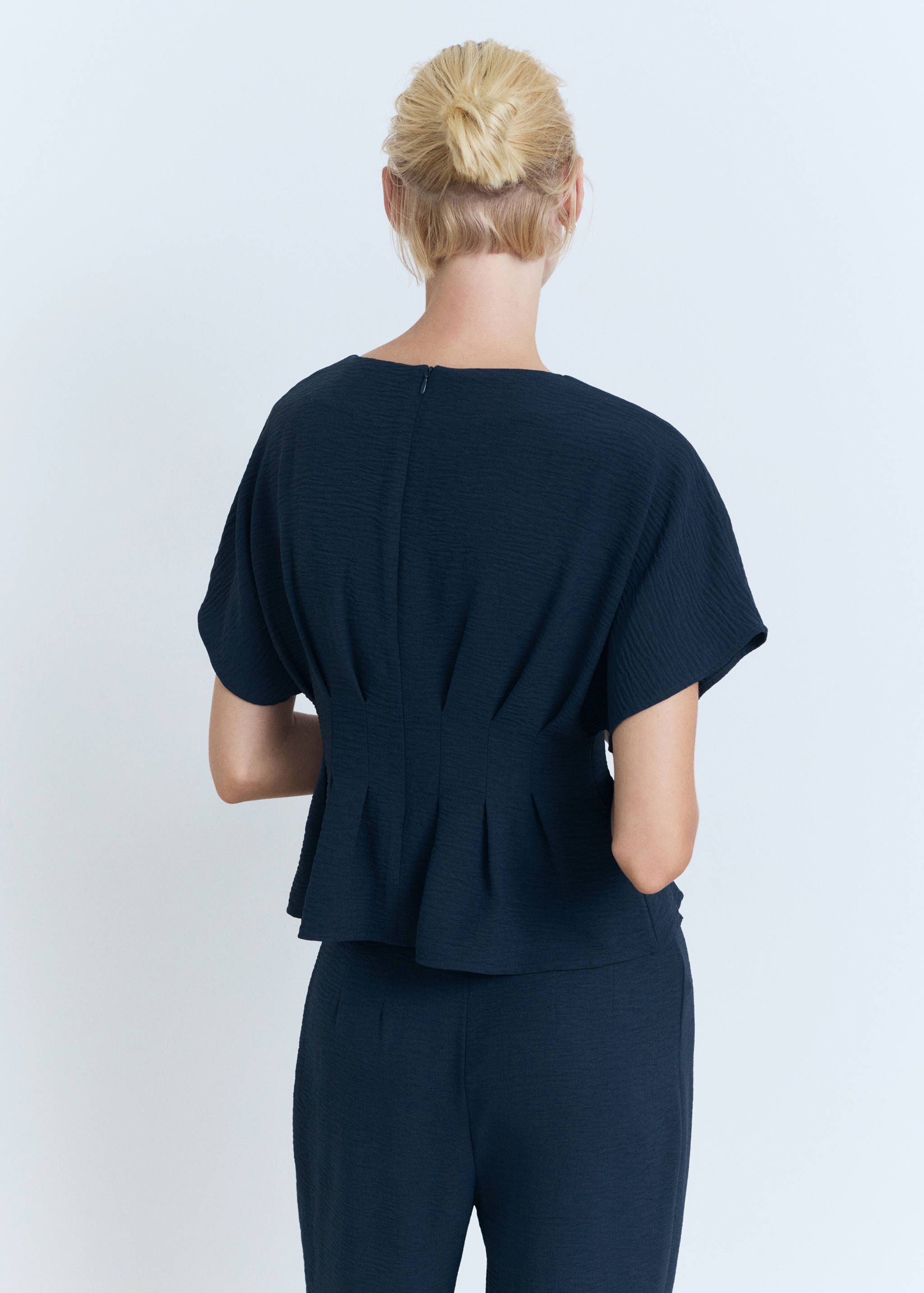 Blusa peplum justa - Verso do artigo