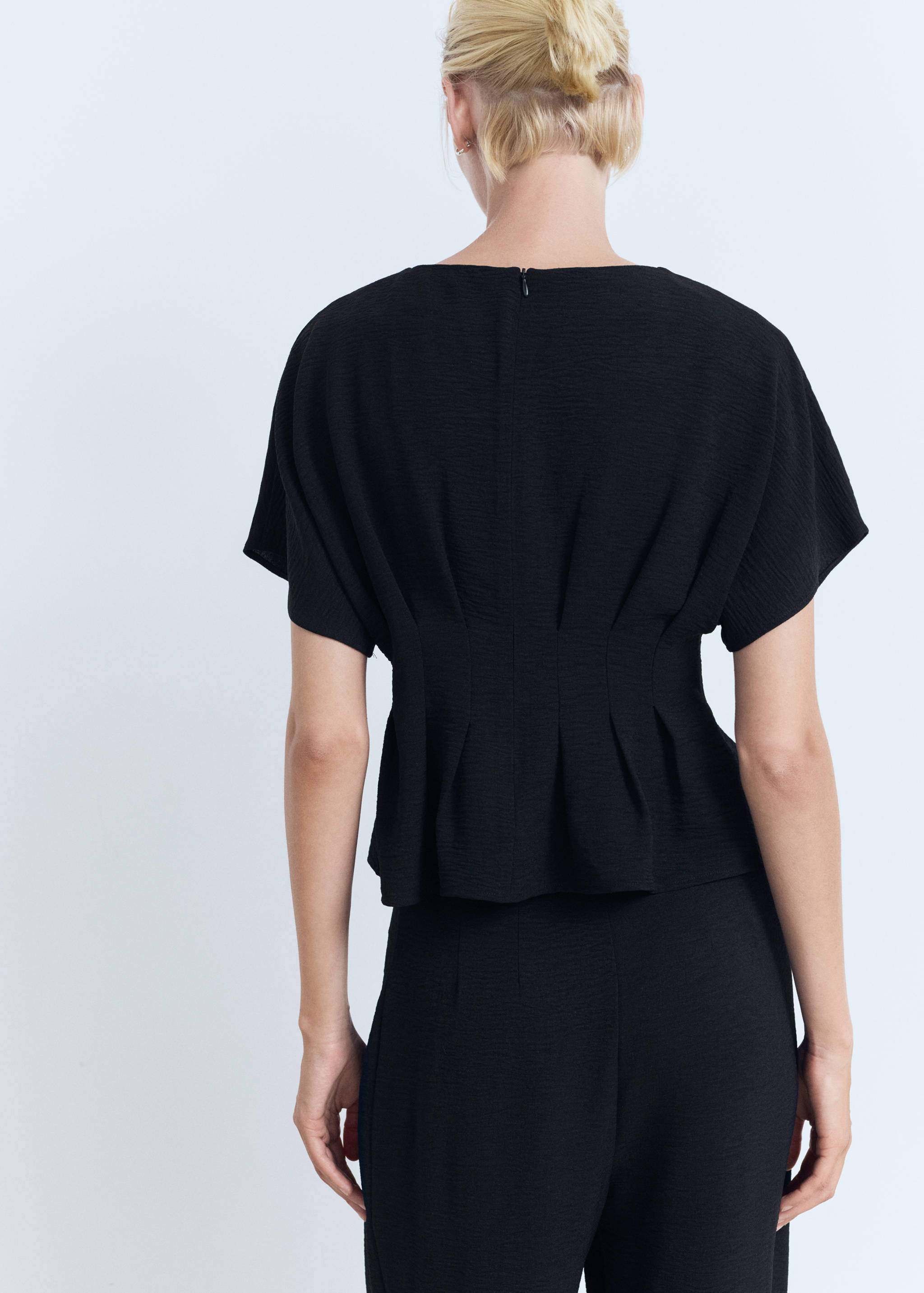 Blusa peplum justa - Verso do artigo
