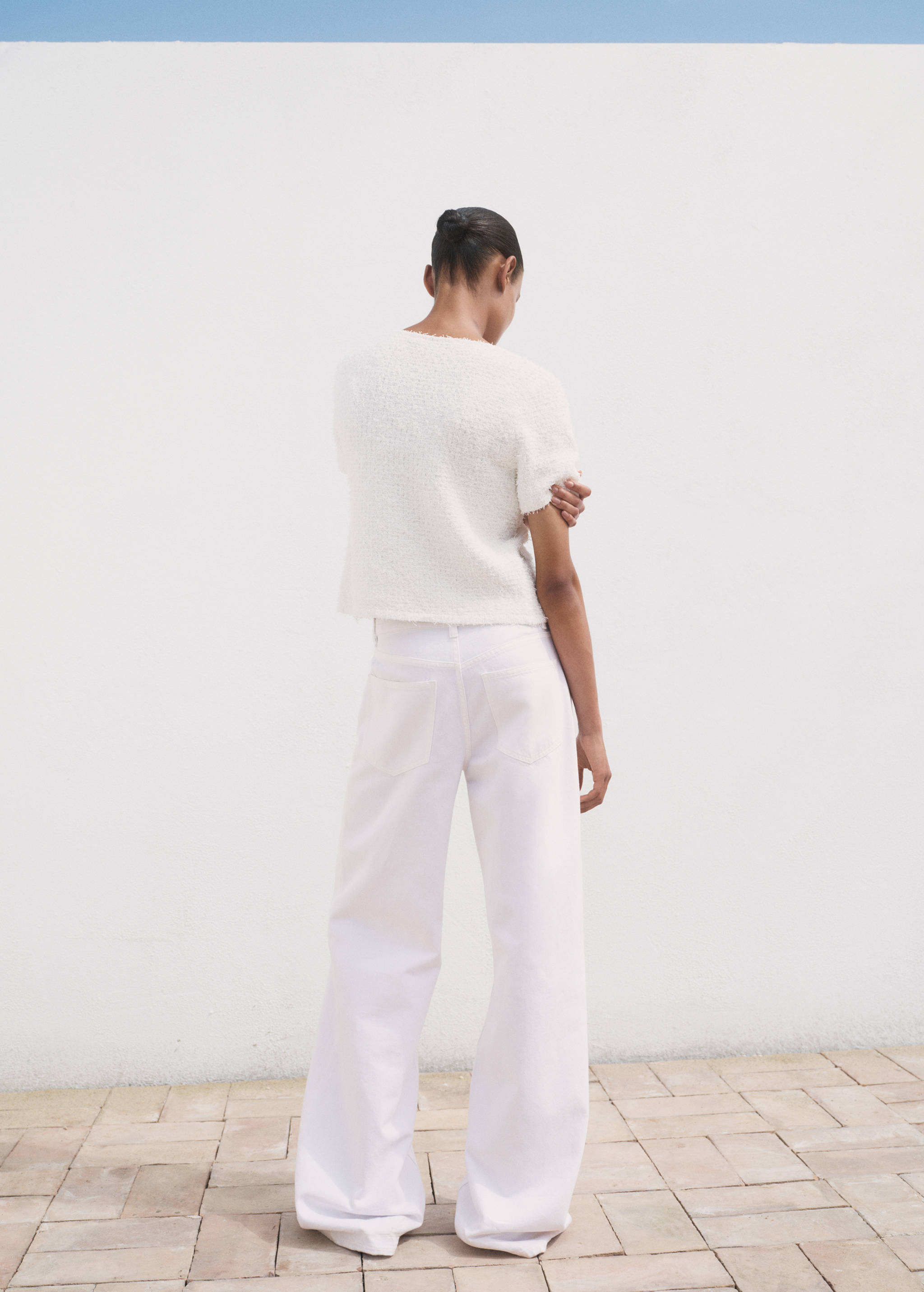 Short-sleeved bouclé cardigan - Reverse of the article