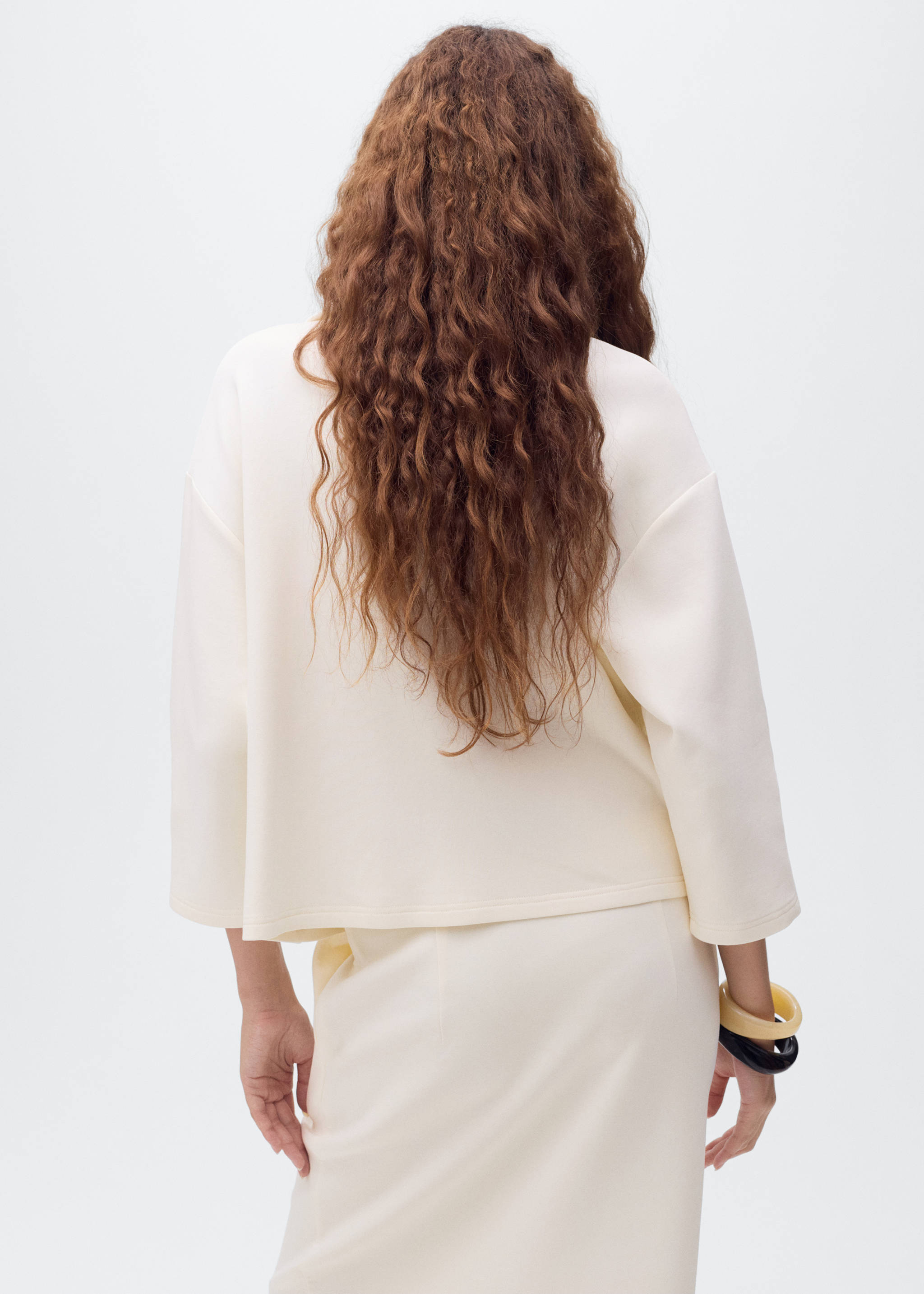 Three-quarter sleeve jacket with pockets - Reverse of the article