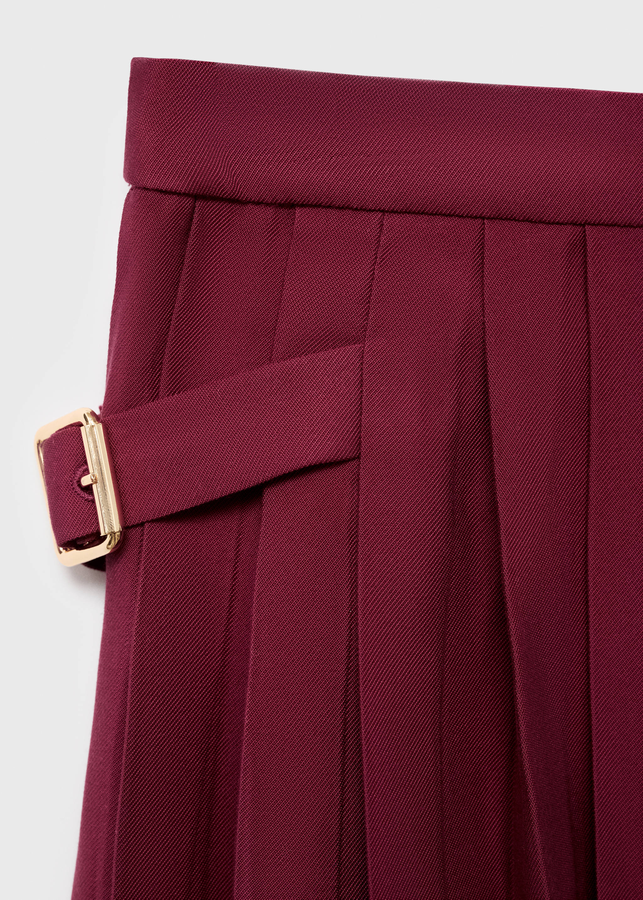 Fustă plisată cu catarame - Detaliu al articolului 8